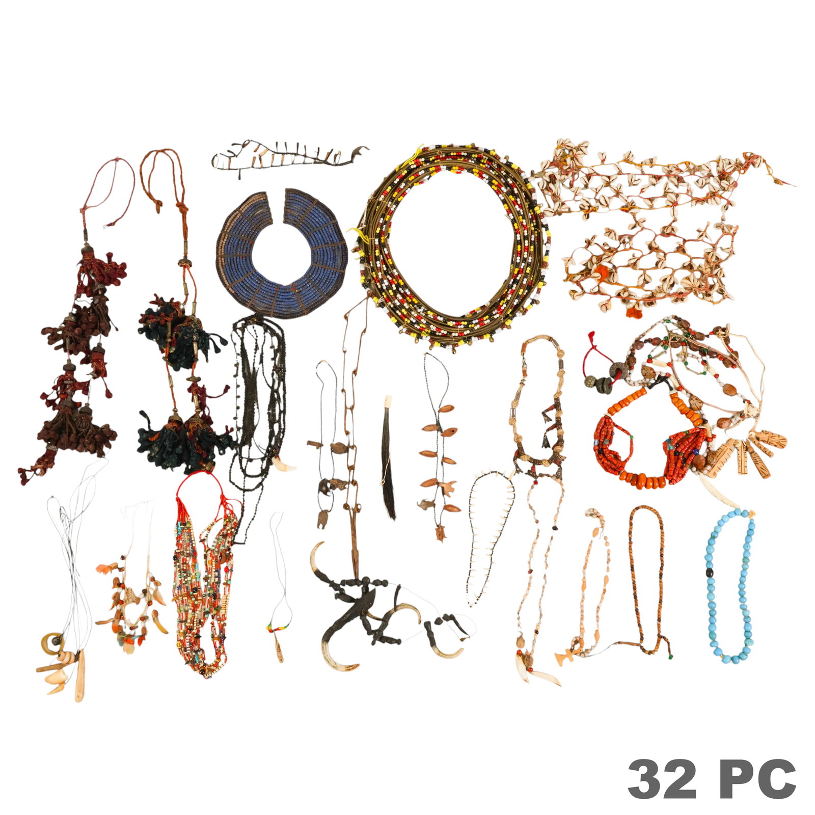 African Ethnographic Tribal Necklaces and MORE LOT: Approximately 32-piece estate collection of ethnic, tribal, and folk art jewelry and adornments representing African, Middle Eastern, Asian, Oceanic, and Indigenous cultural traditions. The group incl