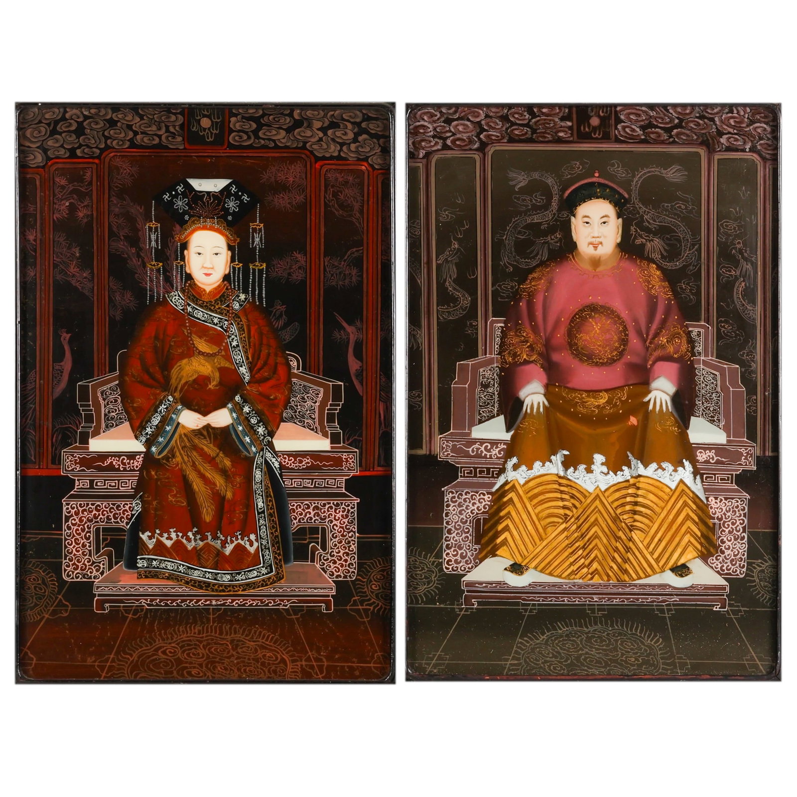 Chinese Emperor & Empress Reverse Glass Paintings: Decorative pair of Chinese reverse-painted glass portraits depicting an emperor and empress seated on elaborate thrones, each presented in a black lacquer-style frame with decorative metal hangers and