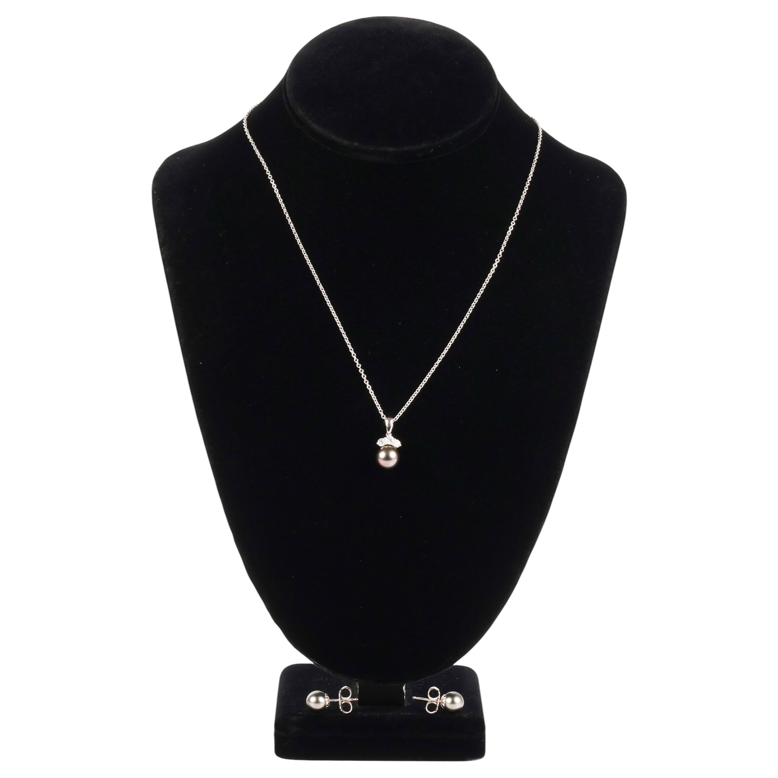 Mikimoto Diamond Pearl Necklace Pendant & Earrings: Mikimoto 18K white gold pendant necklace and matching pearl stud earrings. Pendant set with an approximately 9 mm black cultured pearl suspended beneath three round brilliant-cut diamonds with an esti