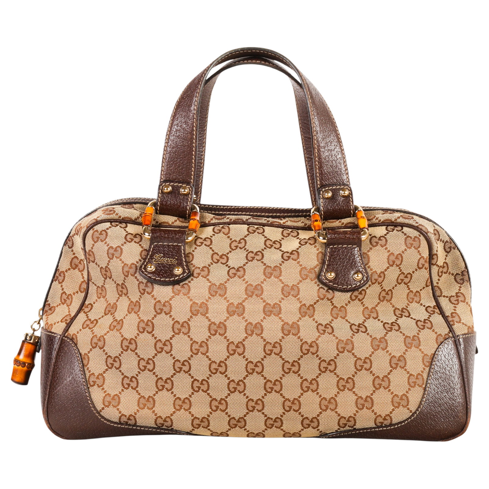 Gucci GG Italian Bamboo Boston Monogram Handbag: Gucci GG Monogram Bamboo Boston bag, vintage, circa 1990s to early 2000s, crafted in the house's signature beige and ebony GG monogram canvas with brown leather trim, rolled leather double handles, go