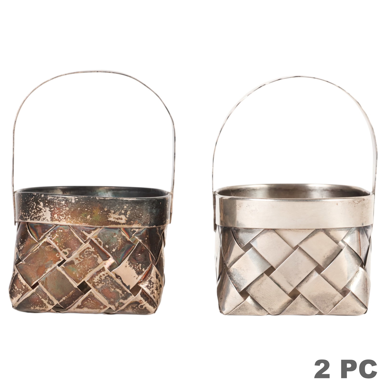 Cartier Sterling Silver Vintage Woven Baskets LOT: Near pair of Cartier hand made sterling silver basket-form vessels with woven construction and swing handles. Each marked "Cartier Hand Made Sterling." Each measures approximately 3 x 2 x 2 in. Combin