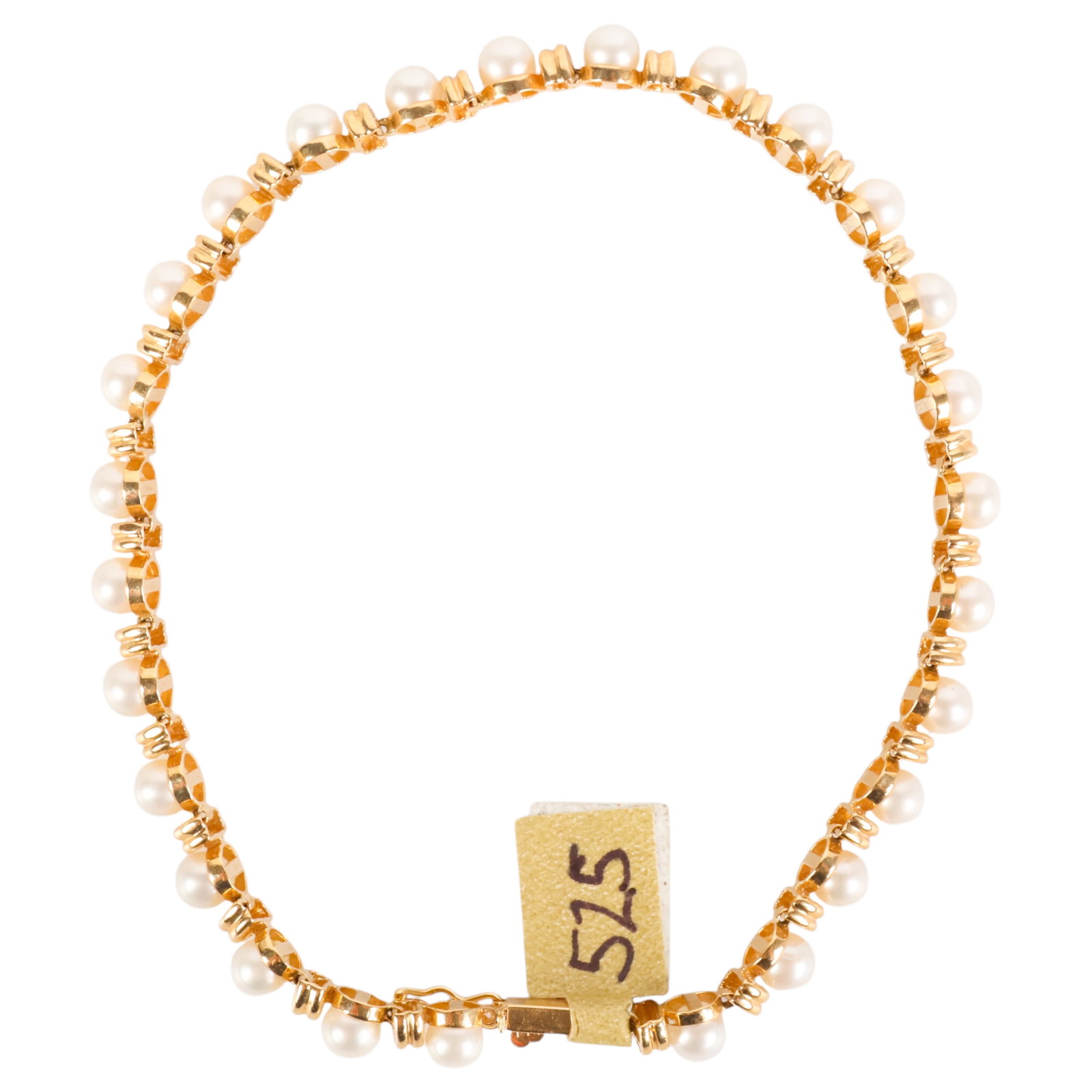 14k Gold Saltwater Cultured Akoya Pearl Bracelet: 14K yellow gold bracelet set with cultured Akoya pearls measuring approximately 3.8 mm each, separated by polished gold spacer links and completed with a 14K clasp. Fits wrists up to approximately 8 i