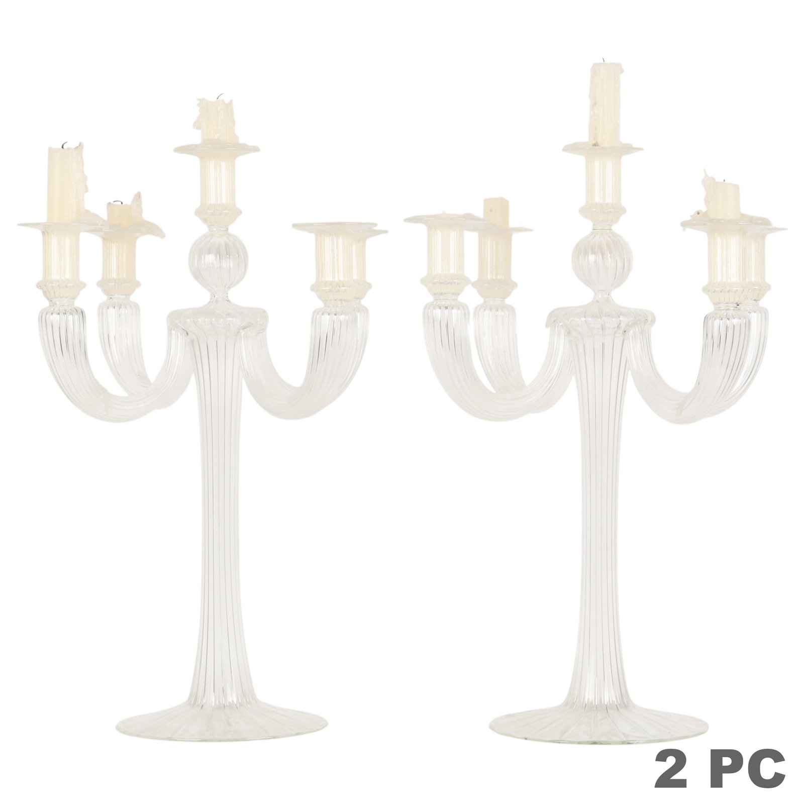 Italian Pair of Blown Glass Five Light Candelabras: Pair of Italian blown glass five-light candelabras, each featuring a clear ribbed glass standard with scrolling arms, baluster-form center, and circular foot. The candelabras are executed in the Venet