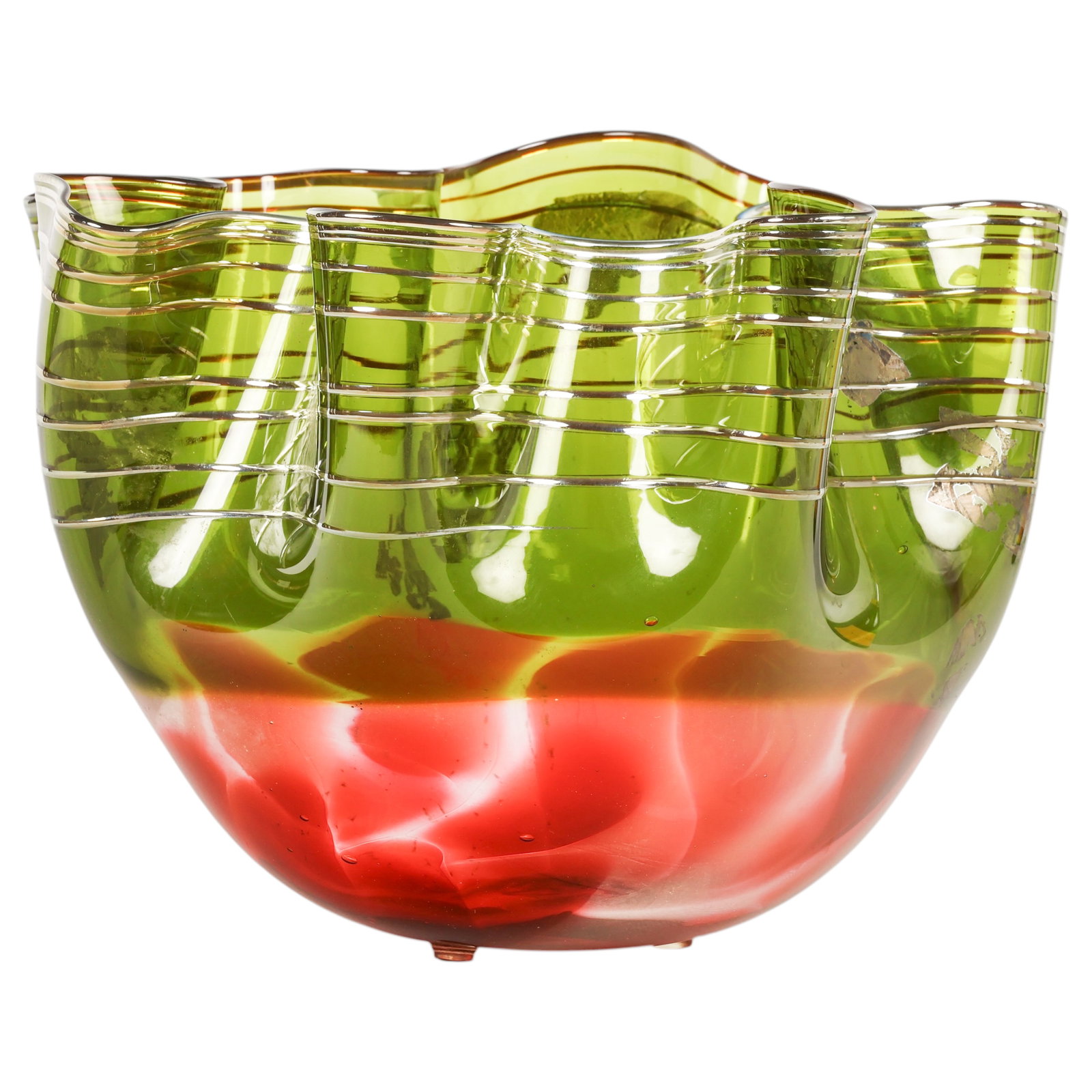 Scott and Laura Curry Green Studio Art Glass Vase: Scott and Laura Curry contemporary studio art glass vase featuring a freeform hand-blown olive green glass body with an undulating rim, internal horizontal white trail decoration, and an amber-toned b