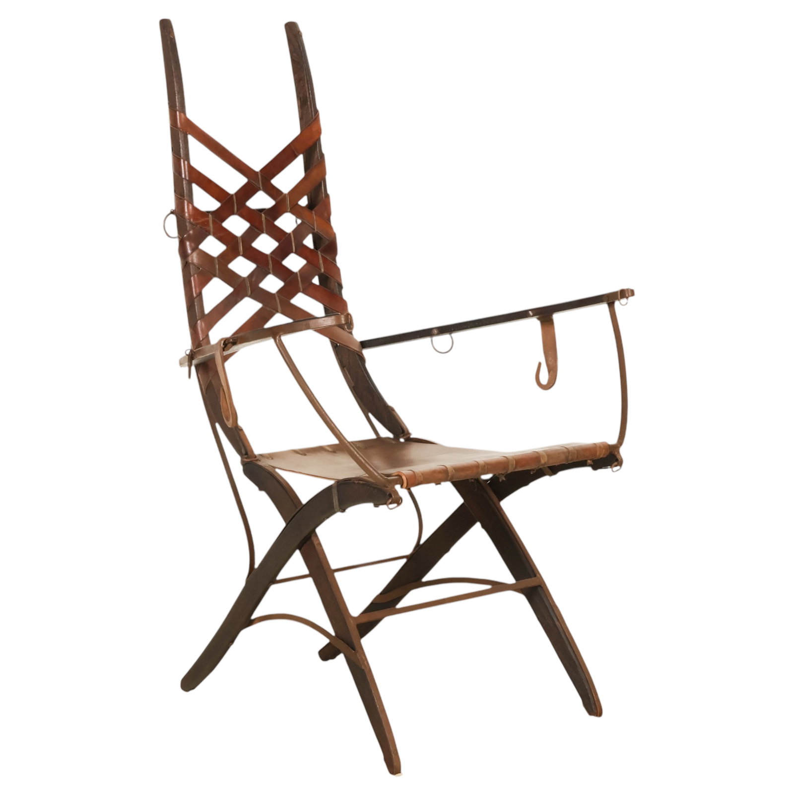 Alberto Marconetti Italian Leather and Iron Chair: 1960s Italian designer Alberto Marconetti leather and wrought iron "Belt Strap" armchair featuring a hand-wrought iron frame with curved arms, dark-stained wood armrests, a woven leather strap back, a