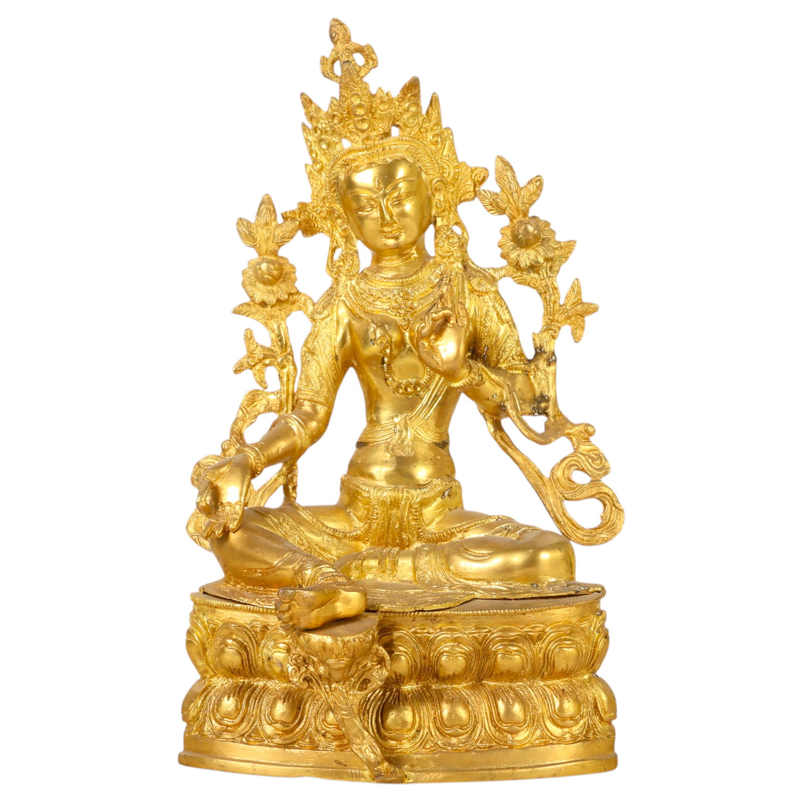 Tibetan Buddhist Gilt Bronze Tara Buddha Sculpture: Antique Indo-Tibetan style gilt bronze figure depicting Tara or a similar bodhisattva seated in meditation on an oblong lotus pedestal flanked by botanical elements. The figure is modeled with hands i