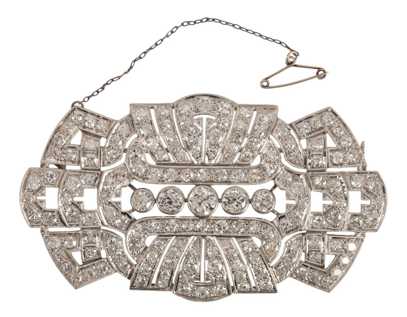 Platinum 12.0 CTTW Diamond Art Deco Brooch 26.9gr.: Art Deco platinum diamond brooch designed in an elaborate geometric openwork form with extensive milgrain detailing and a central horizontal row of five bezel-set round brilliant-cut diamonds, surroun