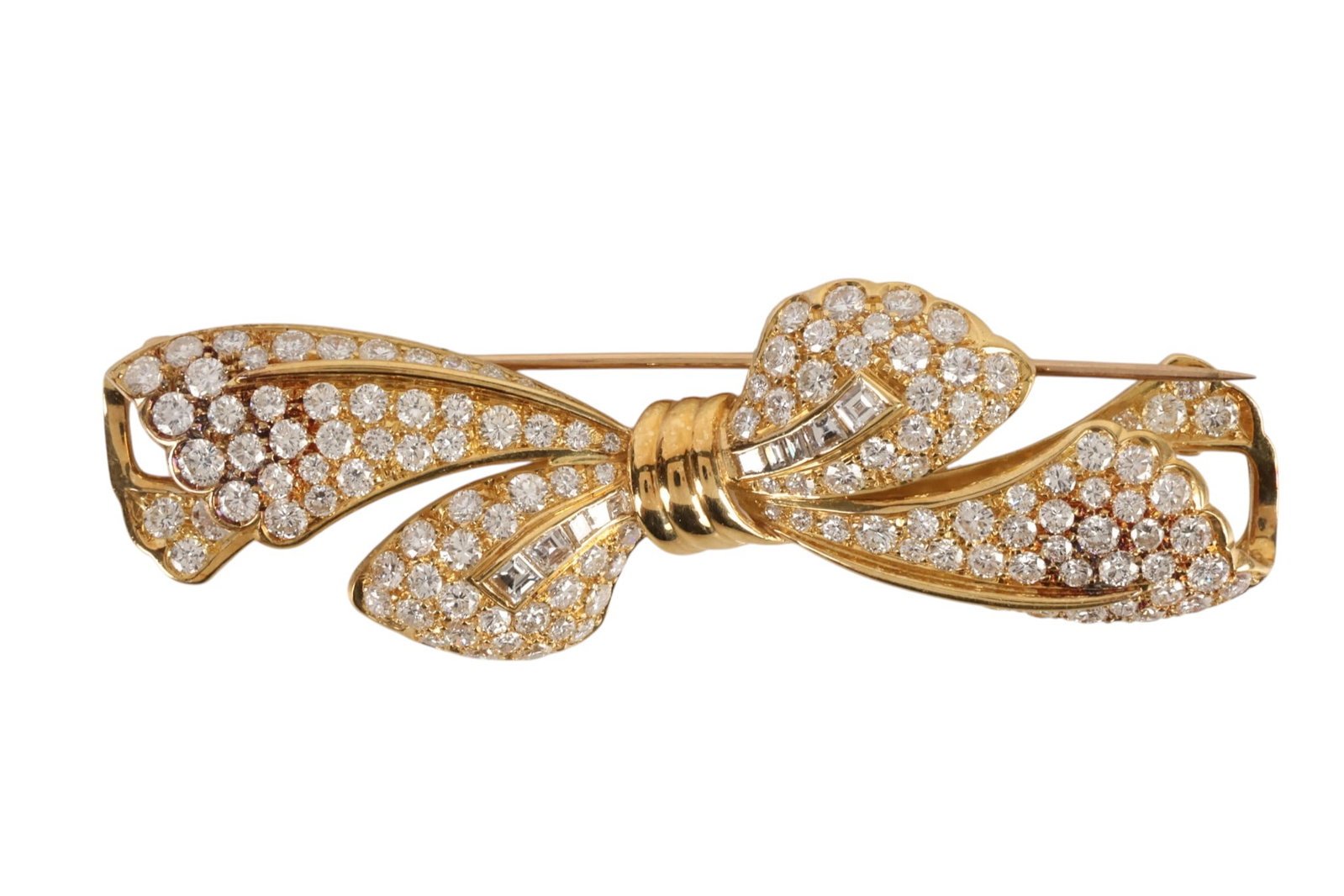 18k and Platinum 8.00 CTTW Diamond Bow Brooch 24g.: Platinum and 18K yellow gold diamond ribbon brooch designed as a sculptural tied bow, pave-set with approximately 111 round brilliant-cut diamonds totaling approximately 8.00 CTTW, accented by polishe