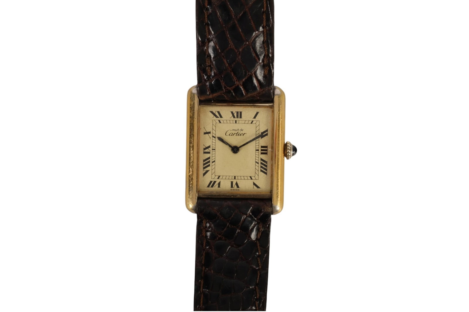 Must De Cartier Vintage Vermeil 925 Tank Watch: Must de Cartier Tank wristwatch featuring a rectangular sterling silver vermeil case, cream dial with black Roman numerals and blued-tone hands, blue sapphire cabochon-set crown, and dark leather stra