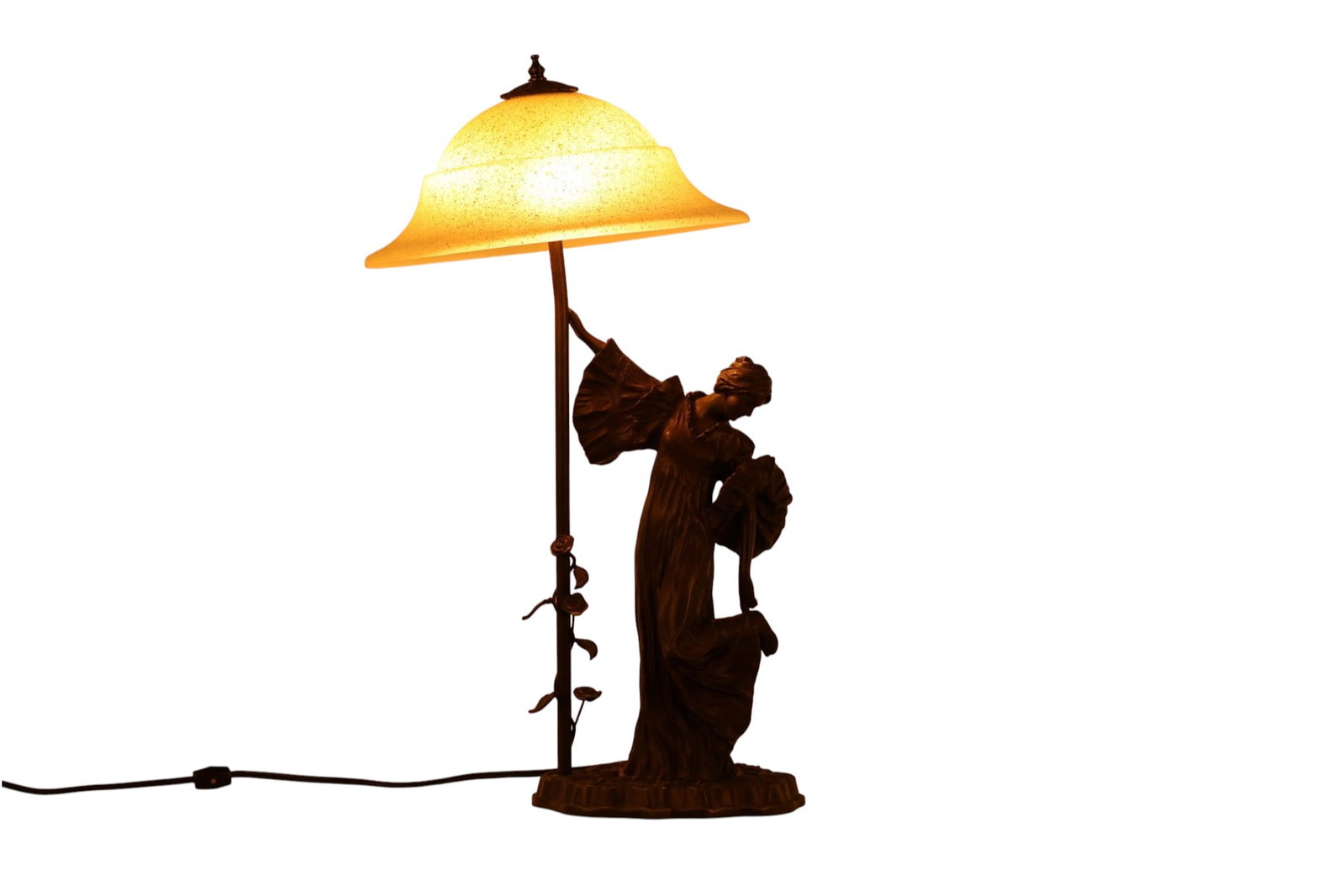 Figural Maiden Bronze Type Lamp with Glass Shade: Art Nouveau-style figural table lamp of bronzed metal depicting a standing maiden in a flowing gown holding a floral bouquet, set on a naturalistic rose-decorated base with an integrated stem embellis