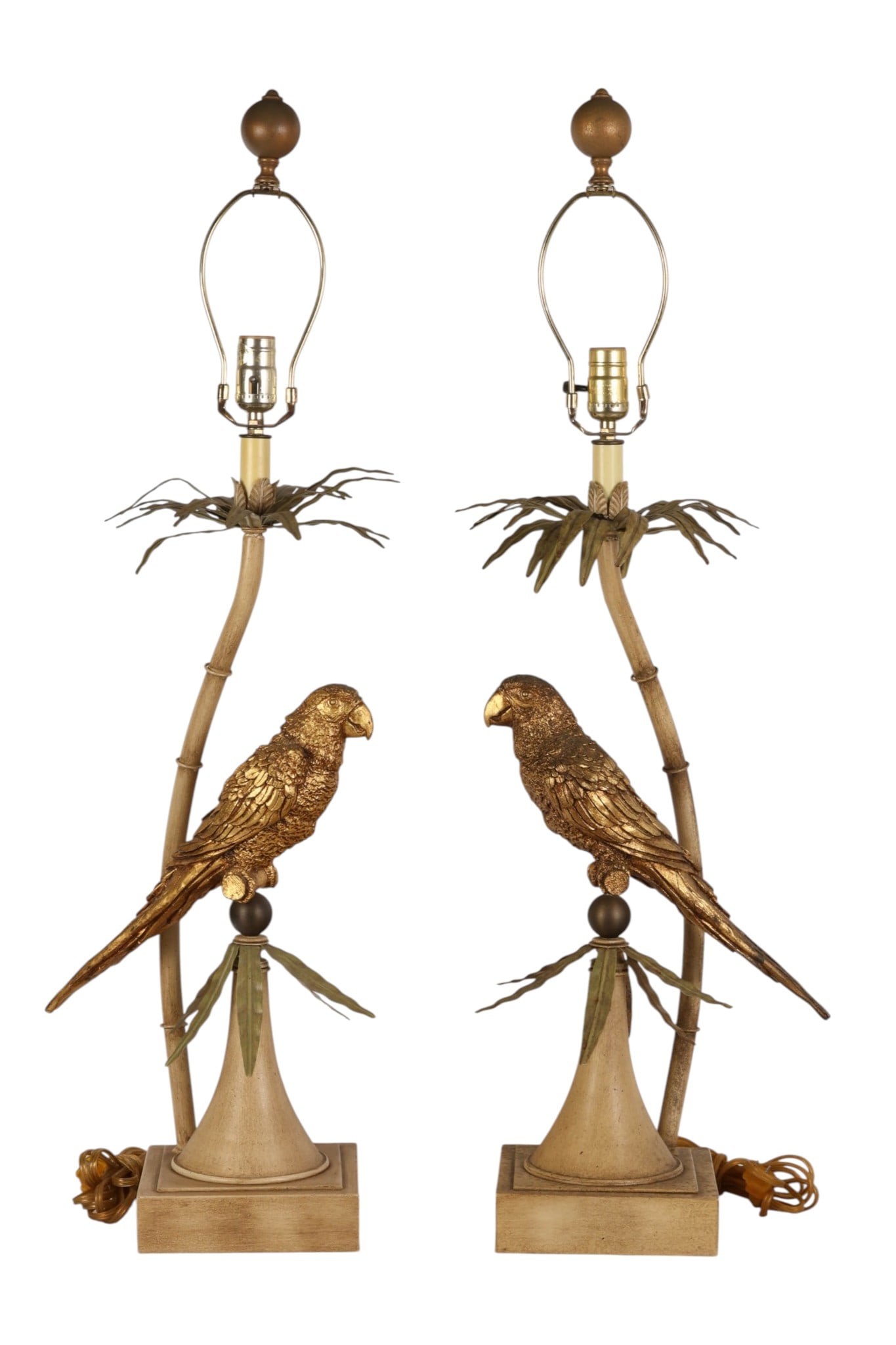 Palm Beach Regency Vintage Gilt Parrot Lamps PAIR: Pair of Hollywood Regency Palm Beach-style parrot table lamps, each featuring a gilt-finished parrot perched among verdigris-tone tropical tole foliage beside a faux bamboo-form stem rising to a leafy