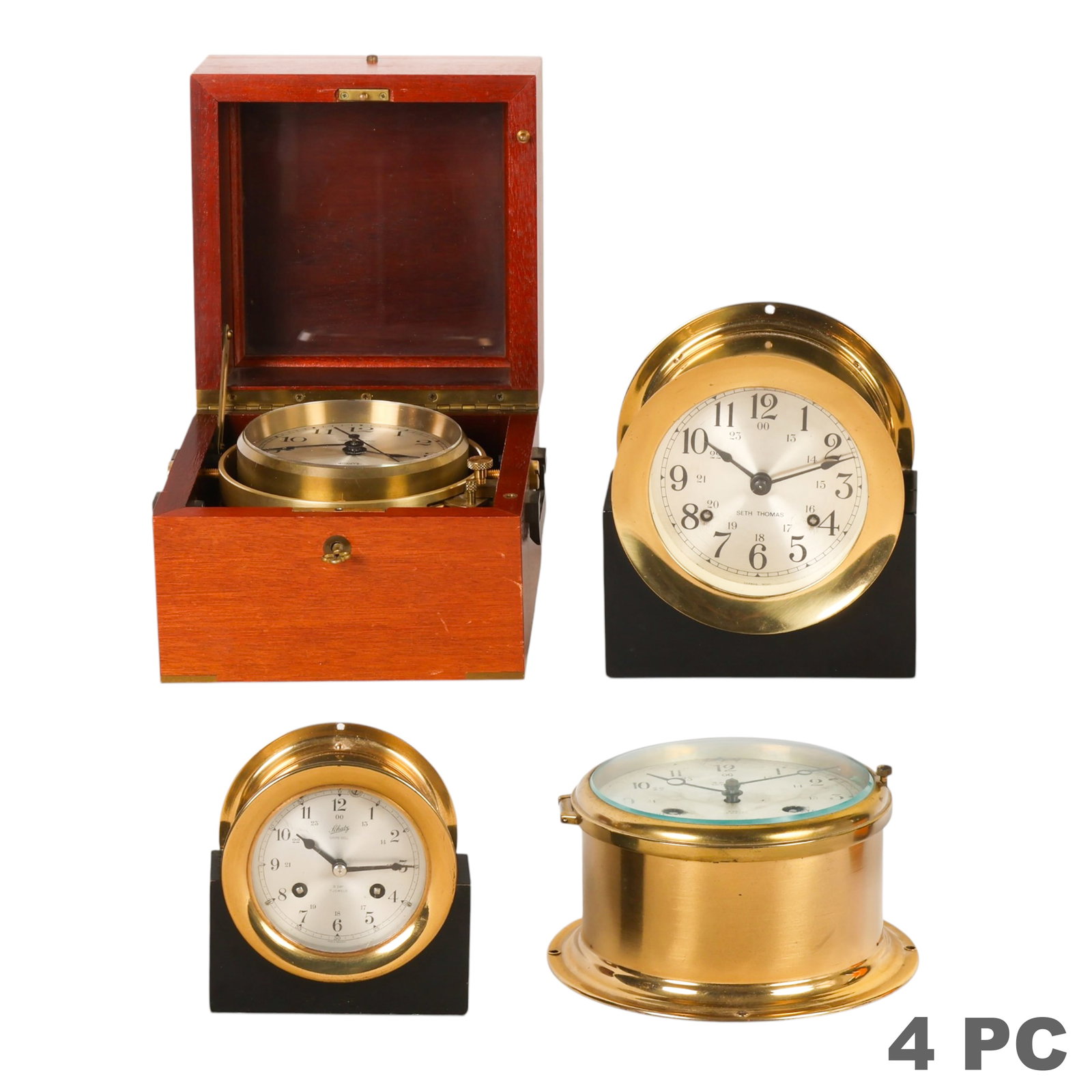Hamilton, Schatz,and More Vintage Ships Clock LOT: Lot of four vintage nautical ship clocks comprising one Hamilton electronic quartz ship's clock with brass case and West German movement, mounted in a hinged mahogany-tone box with front locking key, 