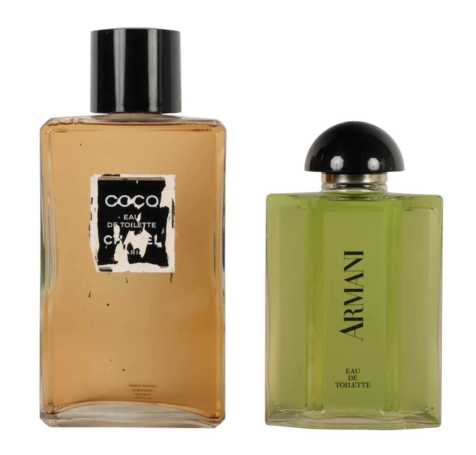 Coco Chanel and Armani Factice Perfume Bottle LOT: Two designer factice display perfume bottles comprising Chanel Coco Eau de Toilette and Giorgio Armani Eau de Toilette. The Chanel bottle features a rectangular clear glass body with amber-colored liq