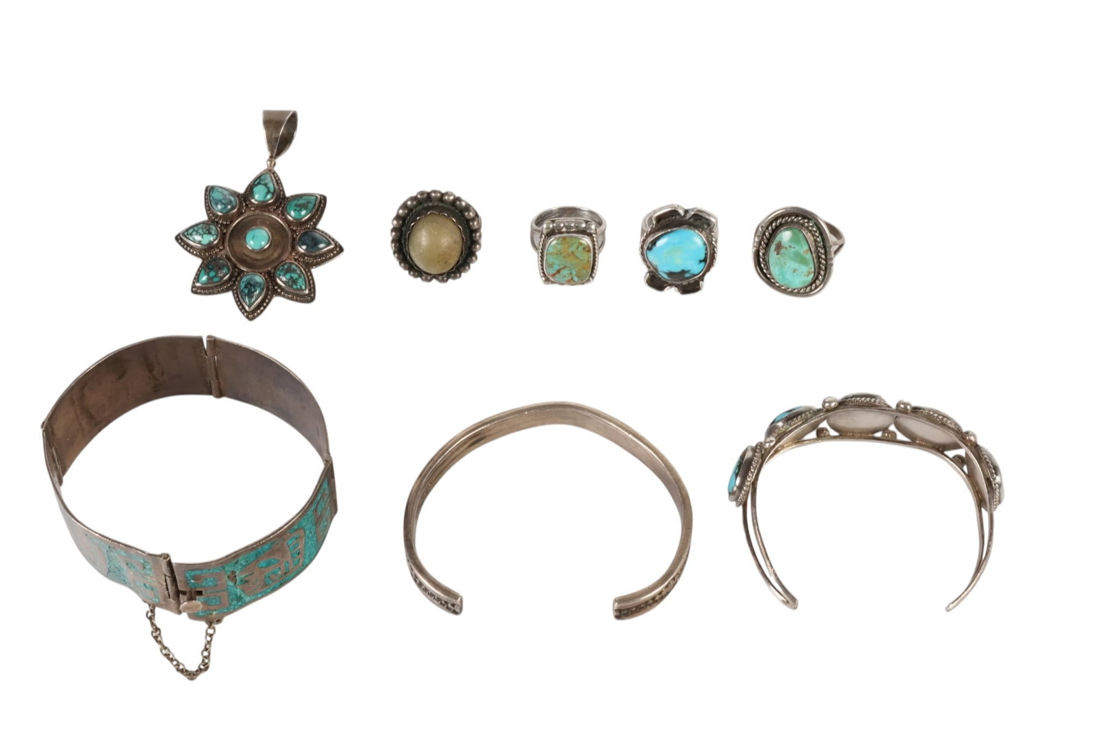 Sterling Turquoise Bracelets Rings Pendant 8pc LOT: Lot of eight vintage Navajo and Mexican turquoise sterling silver jewelry pieces comprising three bracelets, four rings, and one pendant. Bracelets include one Navajo Nora Bill turquoise bracelet, one