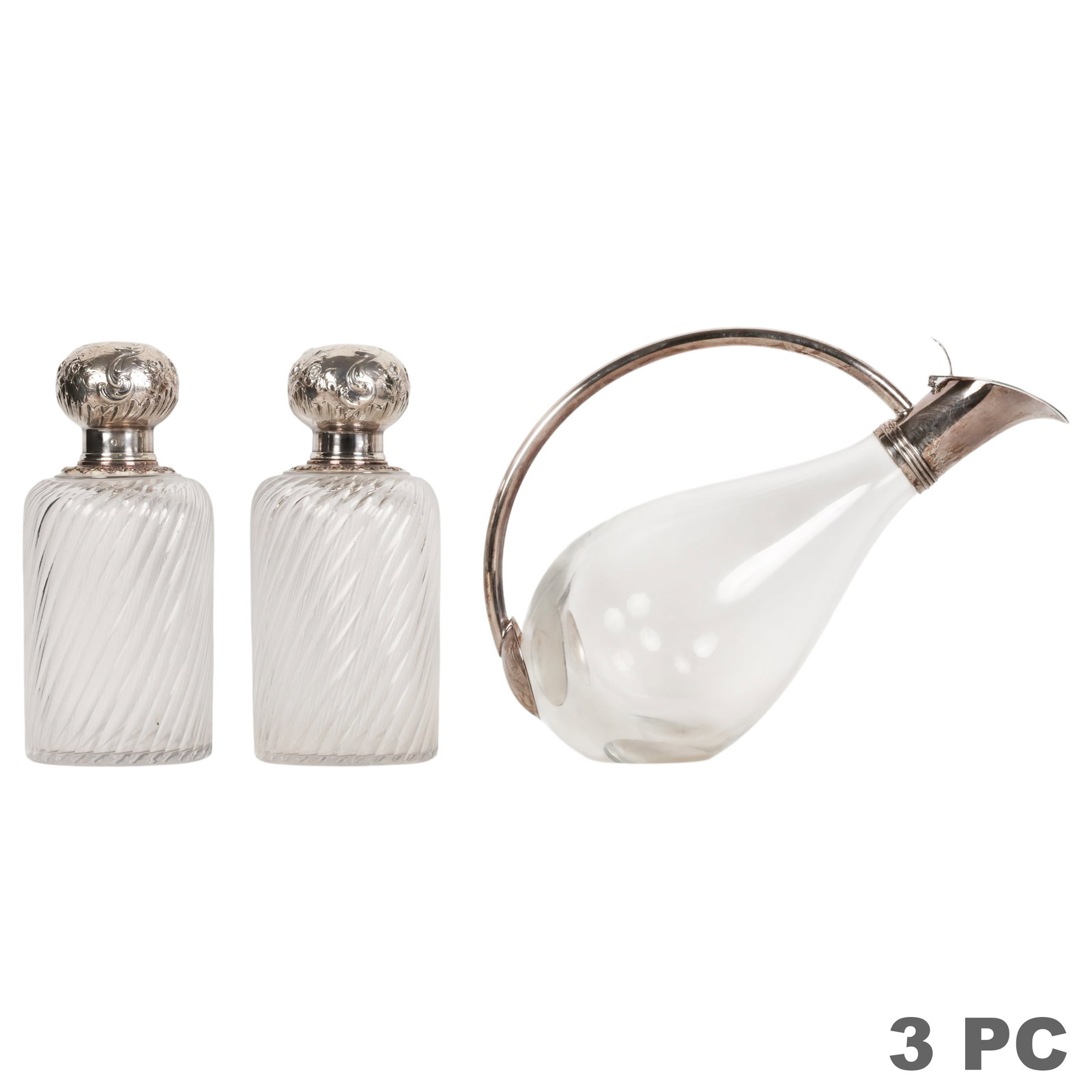 Silver & Glass Wine Decanter & Pair Antique Bottle: Lot of three comprising one modern clear glass wine decanter with sterling silver-mounted neck, curved handle, and hinged pouring spout, together with a pair of antique spiral-fluted crystal dresser o