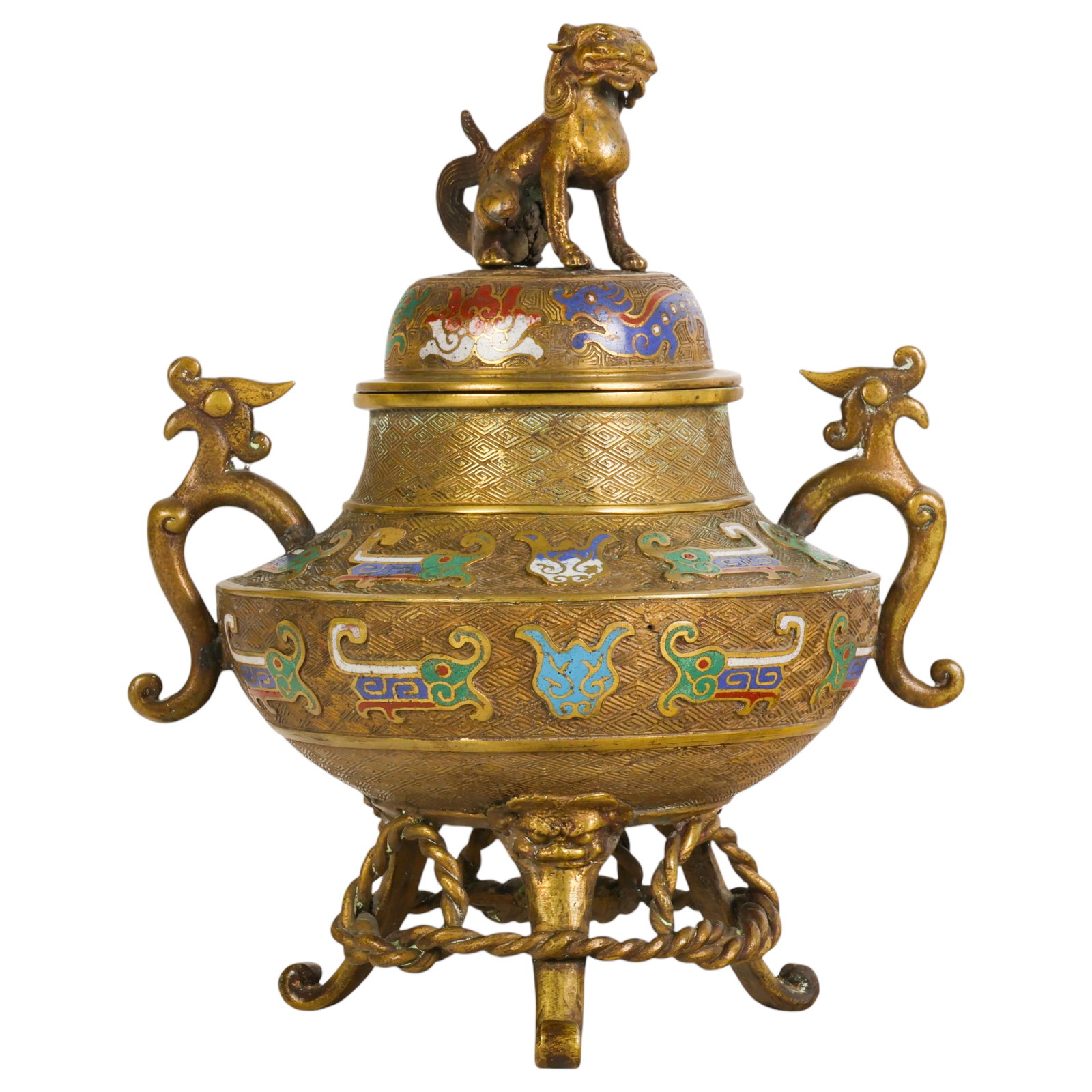 Chinese Bronze Champleve Footed Foo Dog Censer: Chinese-style bronze incense burner of baluster form, decorated with colorful champleve enamel motifs in blue, white, green, and red over an incised geometric ground. Fitted with opposing zoomorphic h