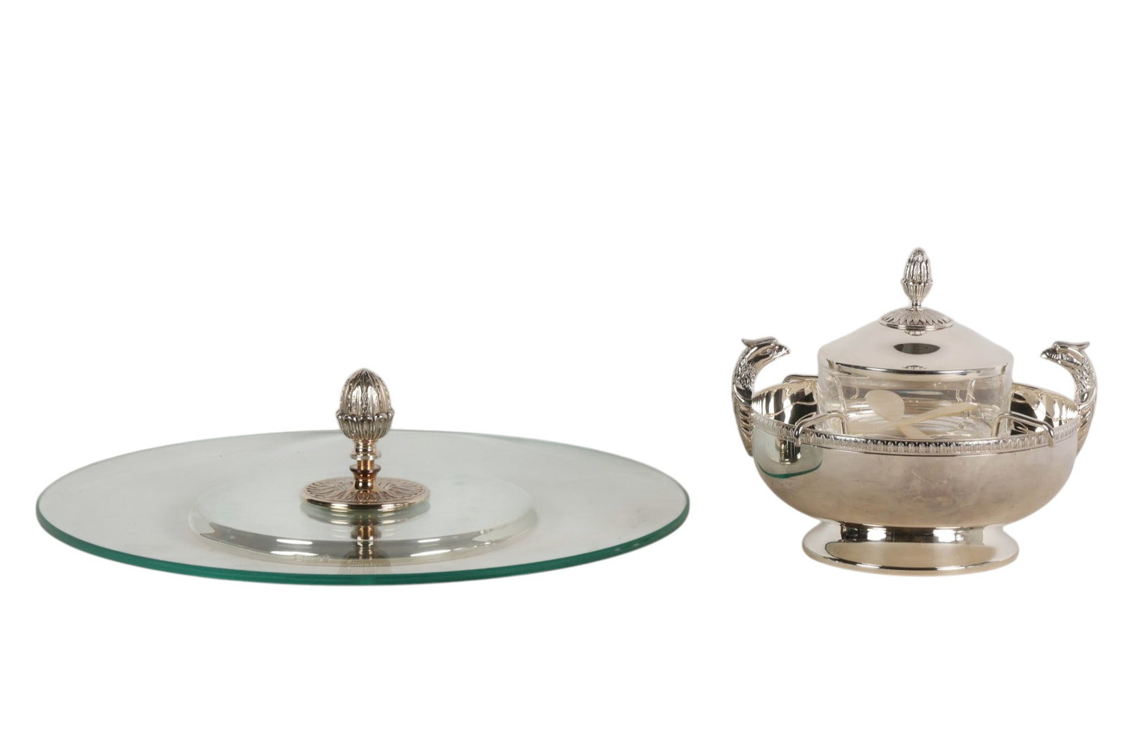 Christofle Malmaison Cheese Tray & Caviar Set LOT: cheese tray 4 x 14 x 14"; caviar serving set 7 x 7 x 7.5".Christofle Malmaison two-piece serving collection comprising one circular clear glass cheese tray with central silver-plated foliate-form hand