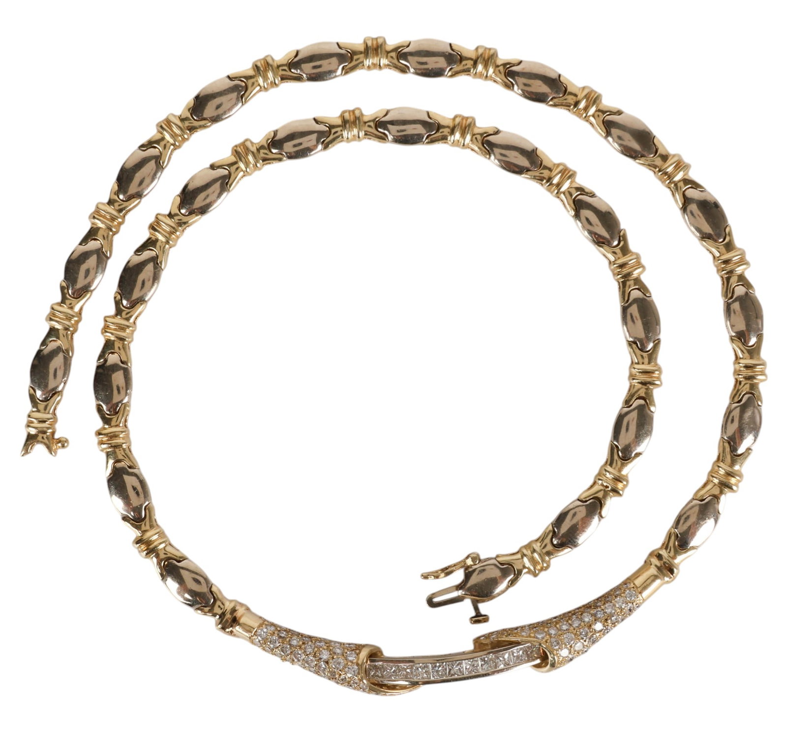 14k Gold 3.2 CTTW Diamond Collar Necklace 50.5g: 14K yellow and white gold vintage necklace featuring alternating polished yellow and white gold links with a center curved bar set with channel set and pave set diamonds. The combined approximate diam