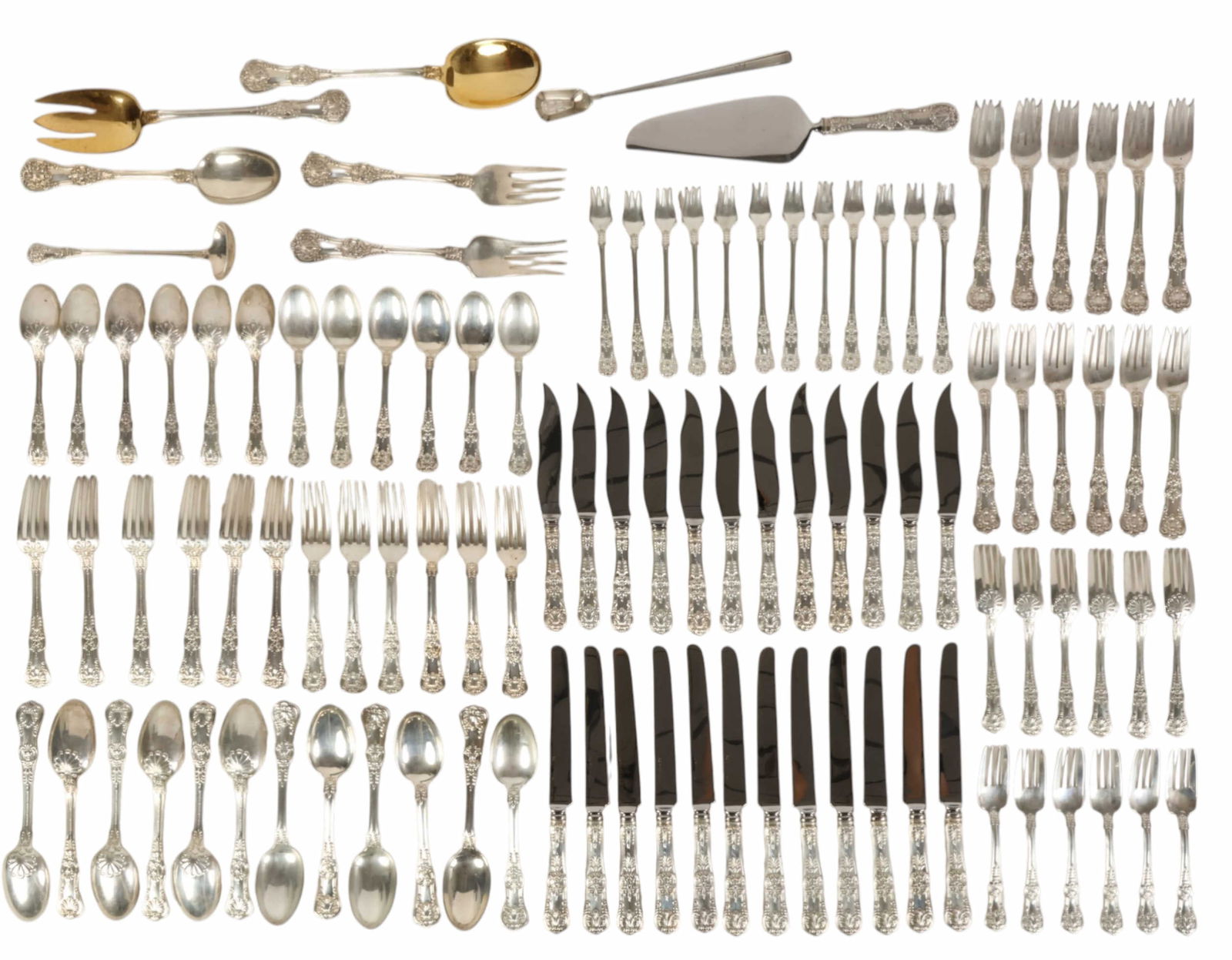 Tiffany & Co English King Flatware Service 4,760g.: Sterling silver flatware service in the English Kings pattern by Tiffany & Company, featuring a classic scalloped tip and scrolled edge design. This 104 piece service includes (1) serving fork, (1) se