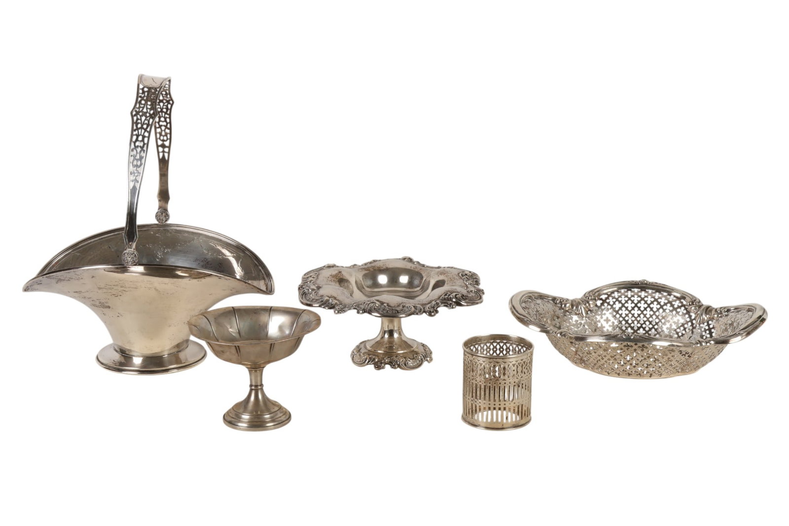 Sterling Silver Basket Bowl Compost 5pc LOT 1,750g: Five piece lot of sterling silver table articles, including a footed compote, pierced bowl with scrolling rim, flared basket bowl with hinged handle, pierced cylindrical holder, and flared footed bowl