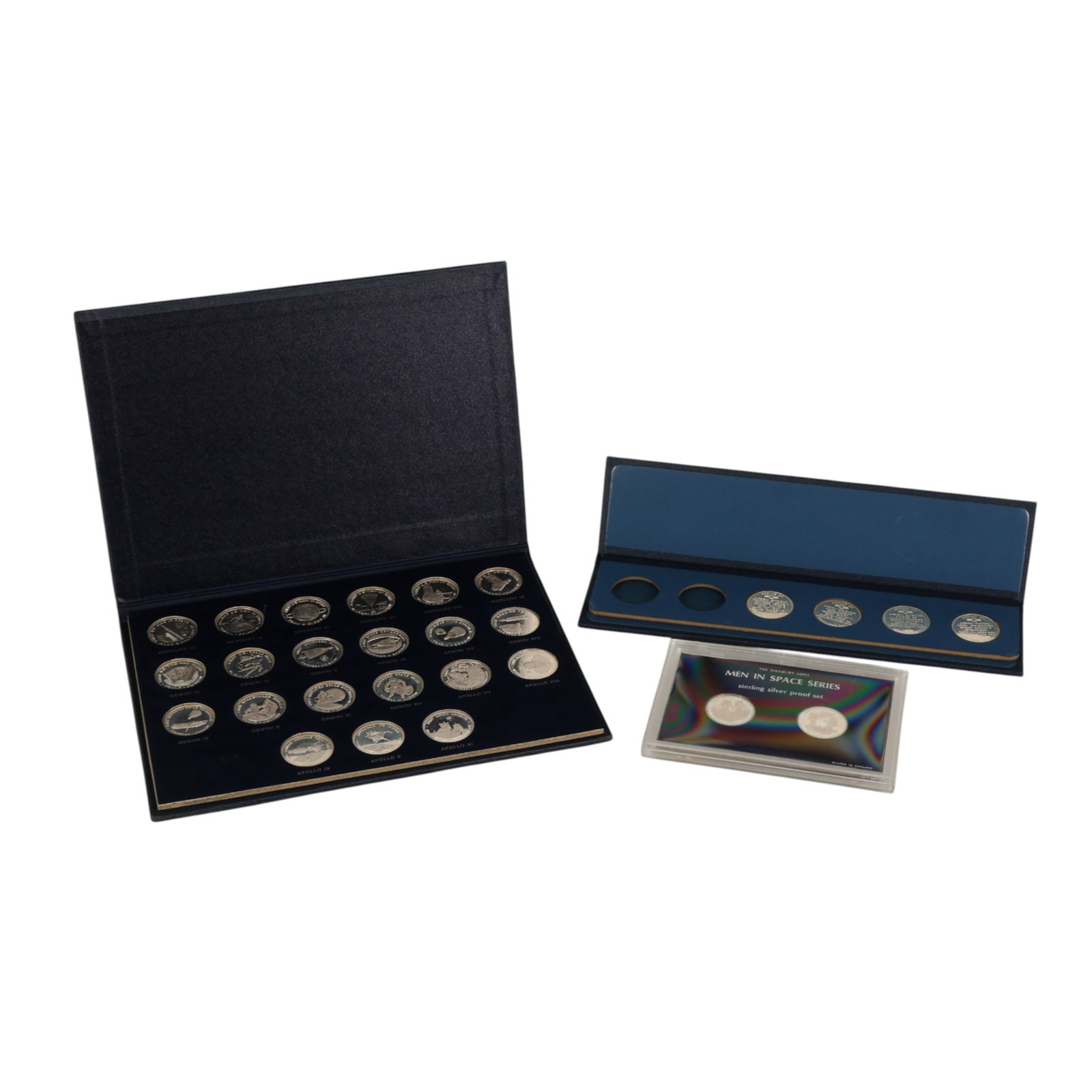 Danbury Mint "Men In Space" Sterling Coin 27pc SET: The Danbury Mint, Men in Space Sterling Silver Proof Set, issued during the historic era of mans first moon landing. Lot comprises 27 sterling silver proof medals dated from May 5, 1961 through Decemb