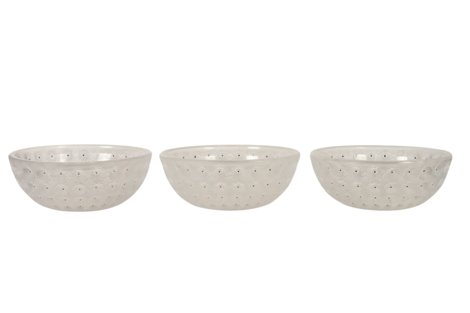 Lalique French Nemours Crystal Flower Bowls LOT: Lalique France, an estate lot of three crystal bowls in the Nemours pattern, each of circular form featuring repeating molded floral motifs in relief accented by black enameled centers throughout the