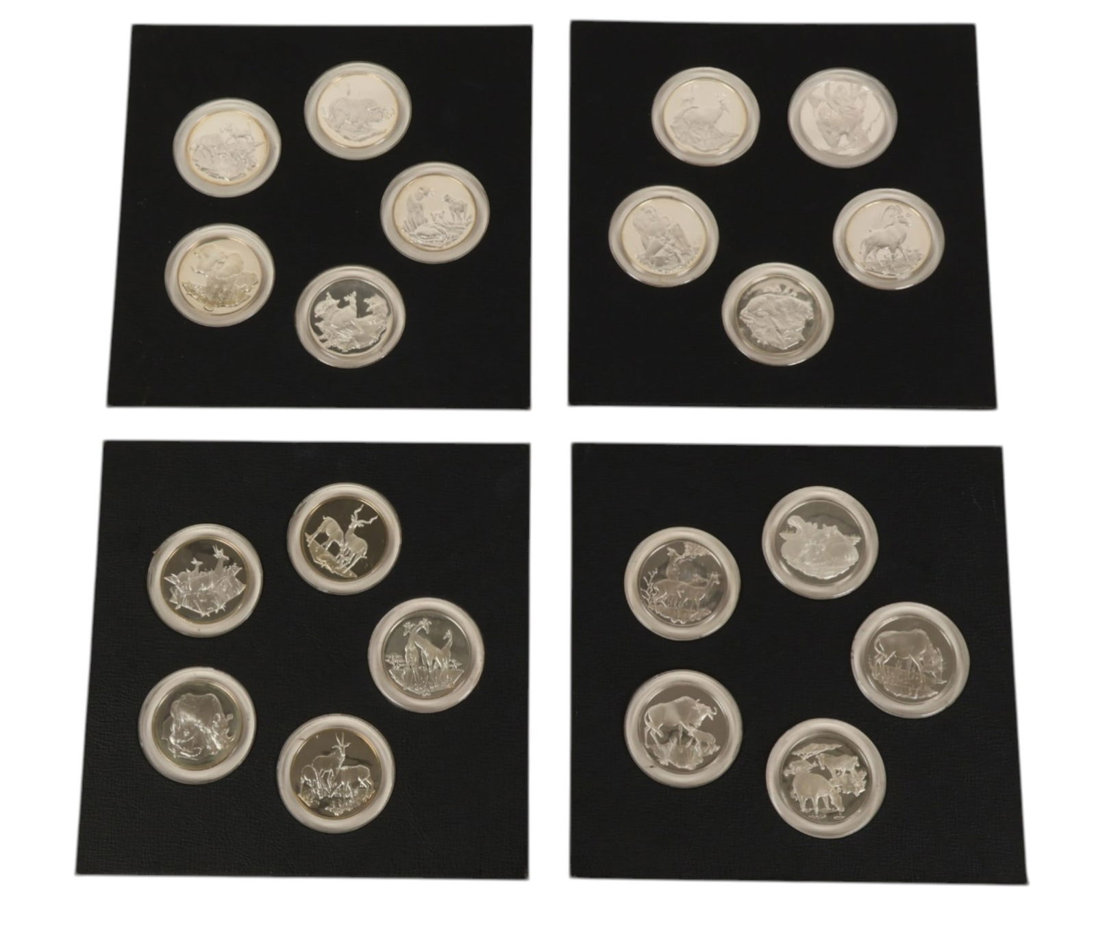 Silver East African Wildlife Society Medallion SET: Franklin Mint, East African Wildlife Society 20 piece sterling silver medallion set, issued 1971 to 1972. Collection comprises twenty silver proof medallions struck on 2 inch (51 mm) sterling silver b
