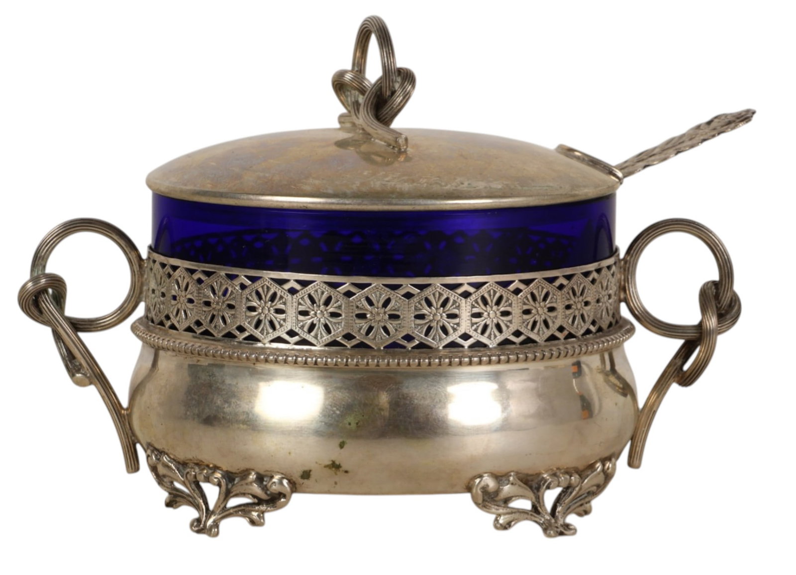 Antique Italian Silver Glass Insert Pot with Spoon: Italian 800 silver, an antique 19th Century glass lined lidded sugar mustard pot of circular form featuring a cobalt blue glass insert and pierced silver gallery. Fitted with two loop handles and a do