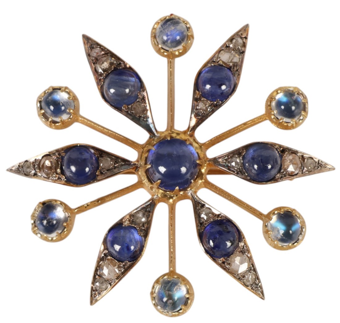 Gold Vermeil Sapphire Moonstone Diamond Brooch Pin: Sterling Silver 925, a gold vermeil star form brooch centered with a blue cabochon and surrounded by alternating round and marquise shaped elements. Each point is accented with small diamonds and addi