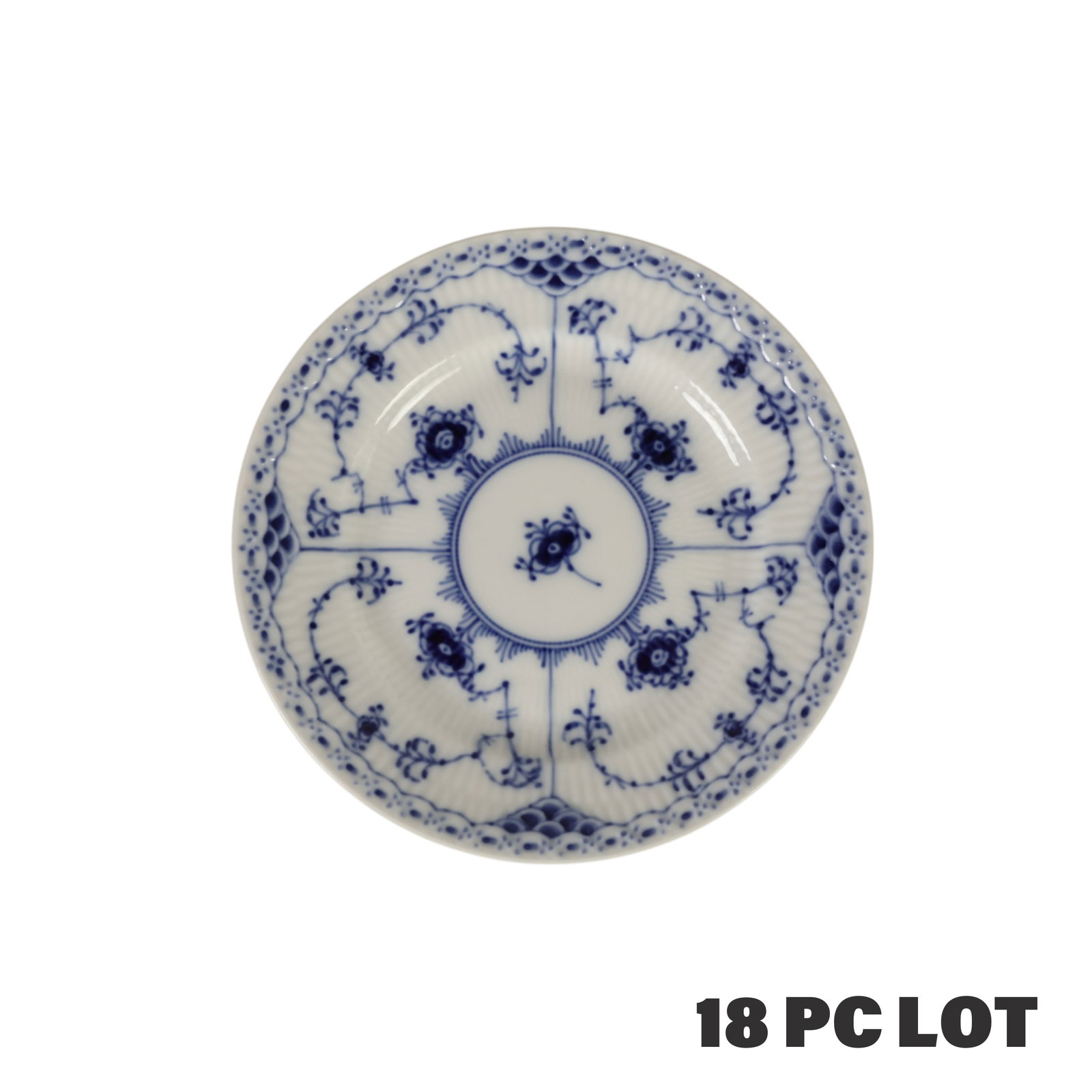 Royal Copenhagen Blue Fluted Half Lace Bread Plate: Royal Copenhagen Denmark, a set of eighteen Danish porcelain Blue Fluted Half Lace Border pattern bread and butter plates. The decoration is characterized by a hand painted cobalt blue floral motif, l