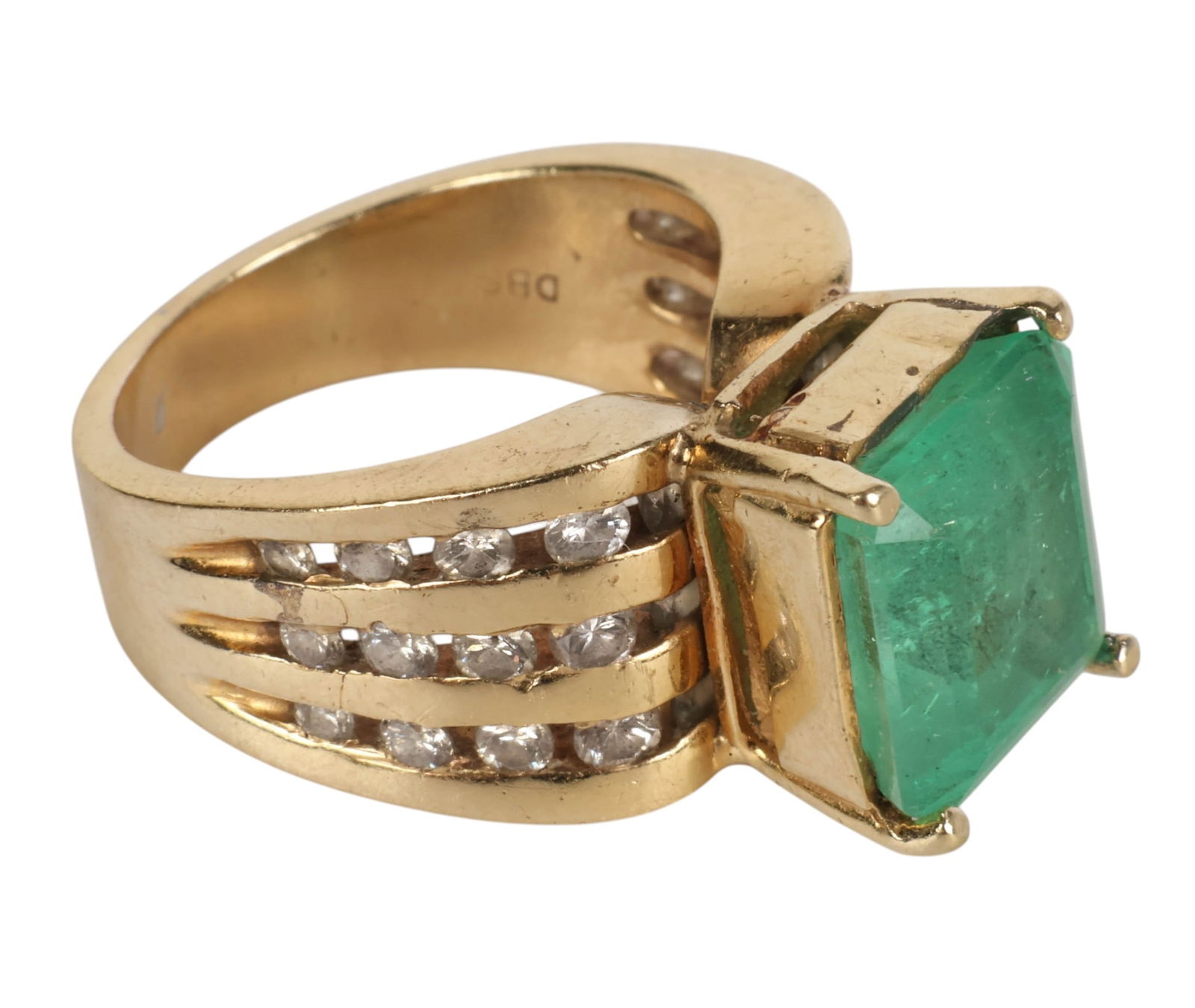 14K Gold 5.5 CTTW Emerald Diamond Sz 6 Ring 11.1g: 14K gold, a ring set with an emerald cut emerald measuring approximately 5.5 carats. Accented with round diamonds totaling approximately 0.32 cttw set along the shoulders. Ring size 6. Stamped 14K gol