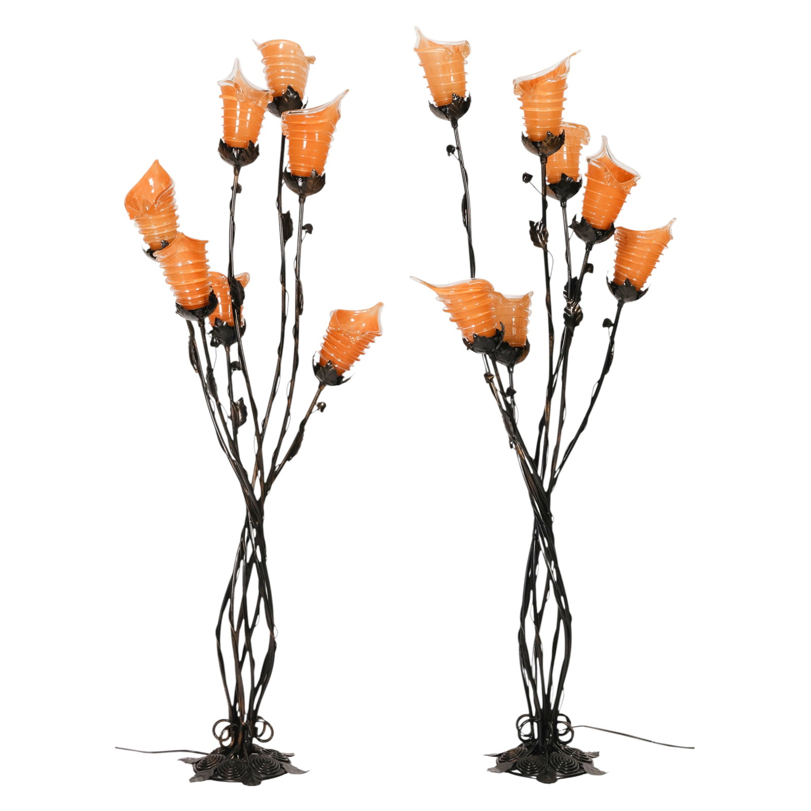 Pair Palm Beach Regency Figural Tulip Floor Lamps: Palm Beach Regency style, a pair of matching hand made wrought iron figural tulip metal floor lamps, each featuring hand blown art glass tulip flowers with stems inspired by natural plant forms, arran