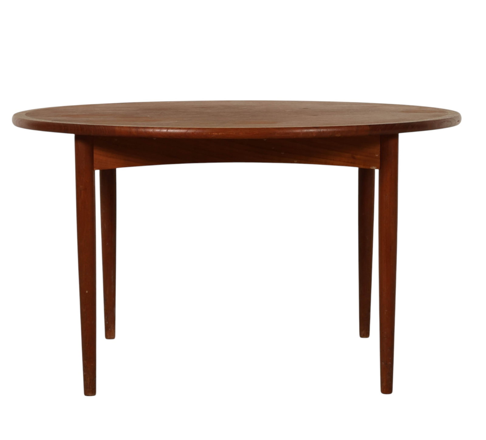 Mobelintarsia Denmark MCM Round Teak Coffee Table: Danish Modern round teak coffee table manufactured by Mobelintarsia, Denmark. The table features a circular teak top supported by four tapered legs with a simple Scandinavian profile. The underside re