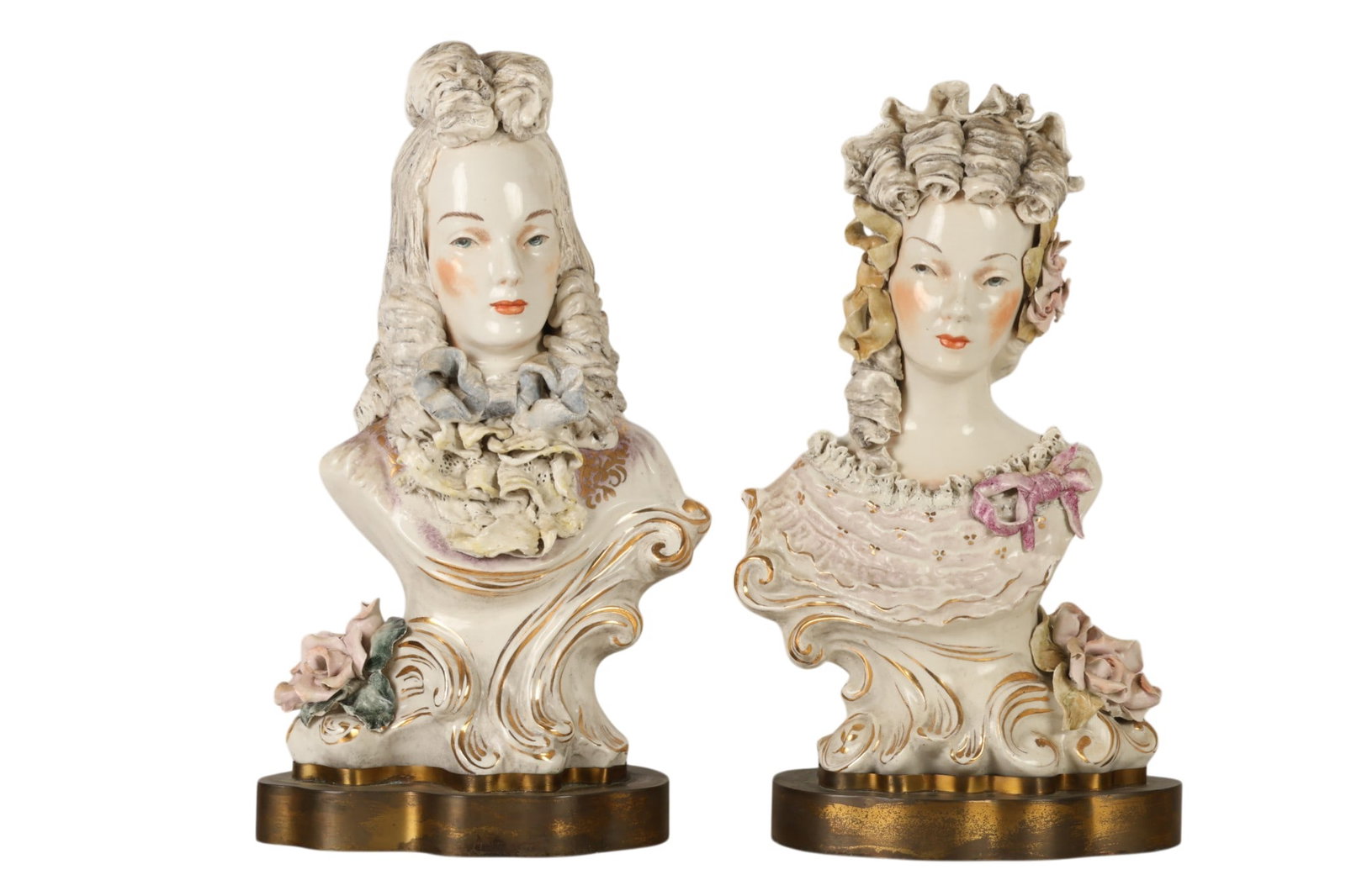 Pair of Cordey Male and Female Porcelain Busts: Cordey, a lot of two handmade porcelain busts depicting an 18th century style lady and gentleman in period dress. Each figure mounted on a bronzed metal base and originally intended for use as lamps.