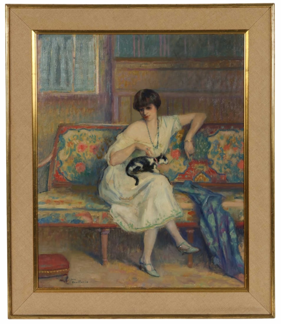 Rene Devillario 1874-1942 Woman with Cat Painting: Rene Devillario (French, 1874-1942), an oil on canvas figural interior scene depicting a seated woman holding a cat while resting on a settee. The intimate domestic composition reflects Devillario's a