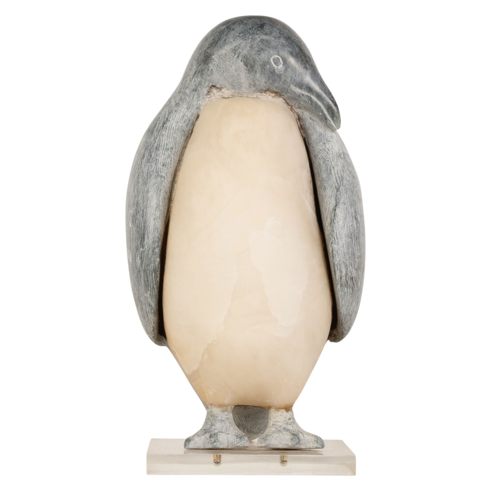 Inuit Carved Hardstone Penguin Bird Sculpture 16": Hardstone carving, a hand carved penguin sculpture formed from two contrasting types of stone featuring a dark head and wings with a lighter toned torso, the bird modeled standing upright with incised