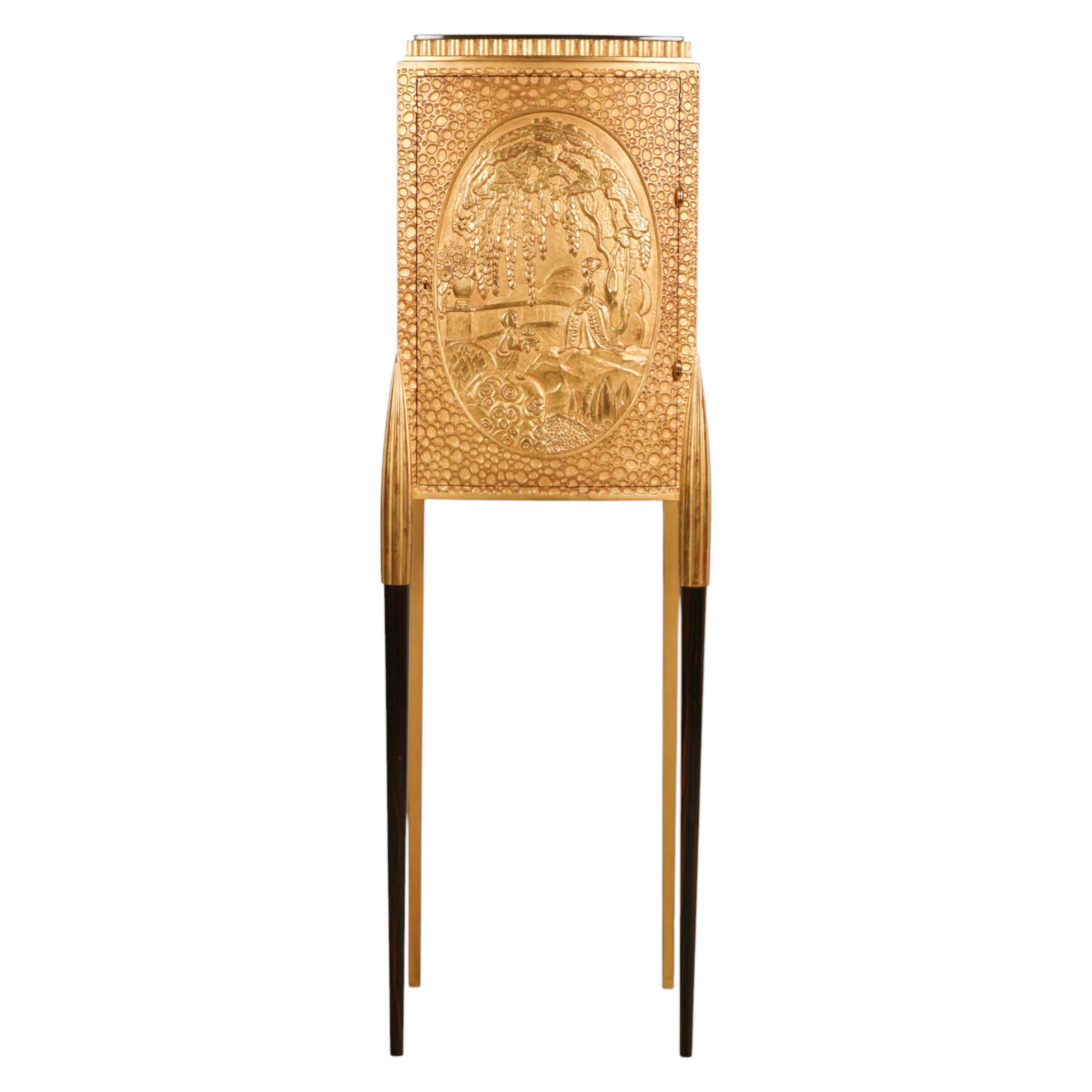 Emile-Jacques Ruhlmann Gilt French Deco Cabinet: French, an Art Deco cabinet in the manner of Emile Jacques Ruhlmann and Albert Besnard featuring a central oval bas relief panel depicting a classical figural landscape beneath a weeping tree. The