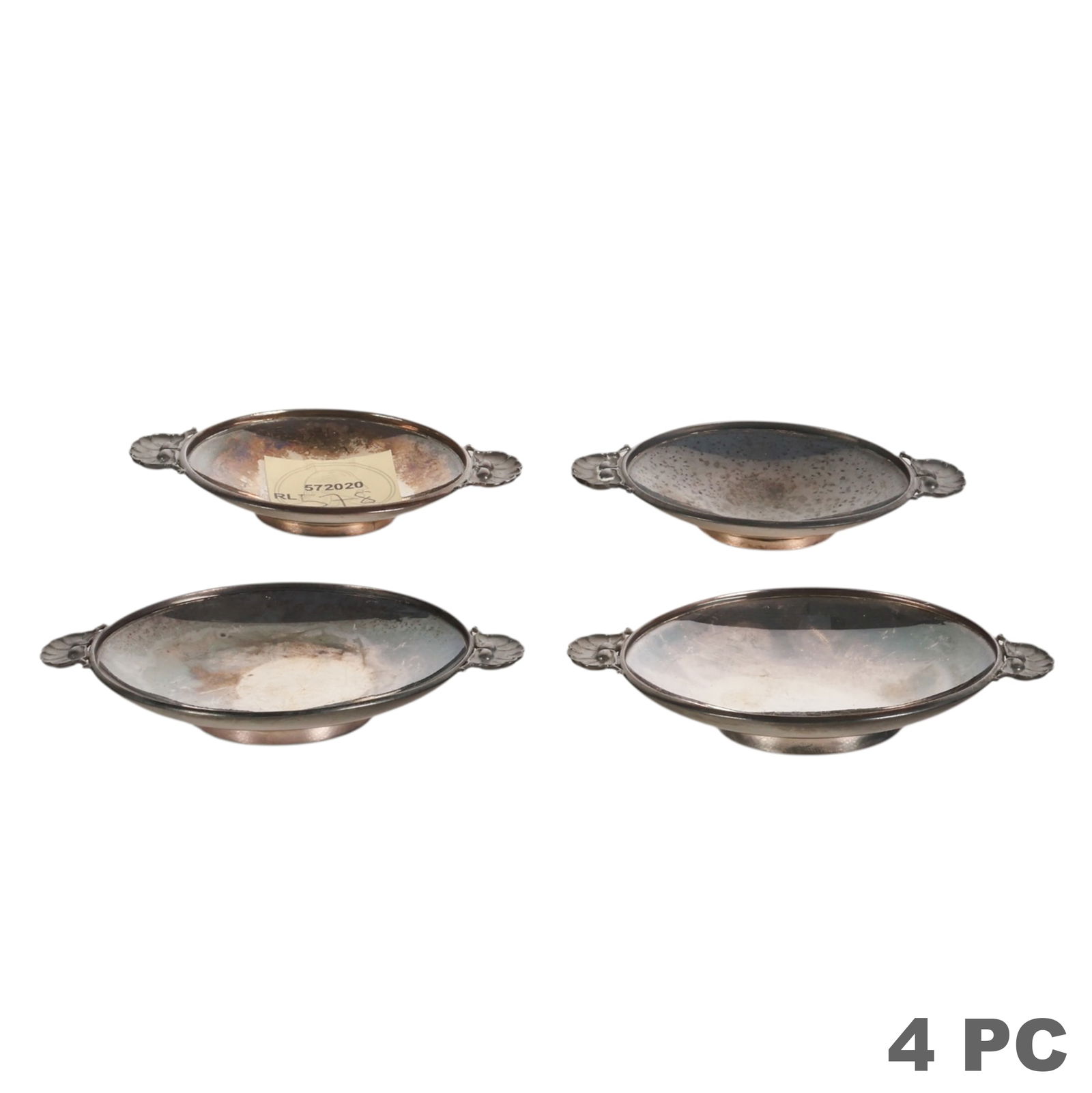 Georg Jensen Sterling Salt Cellar Dish 4pc LOT: Georg Jensen Denmark, a set of four sterling silver small tazza form salt cellars or miniature tray dishes, each featuring gently flared sides and twin scalloped seashell form handles. The elegant