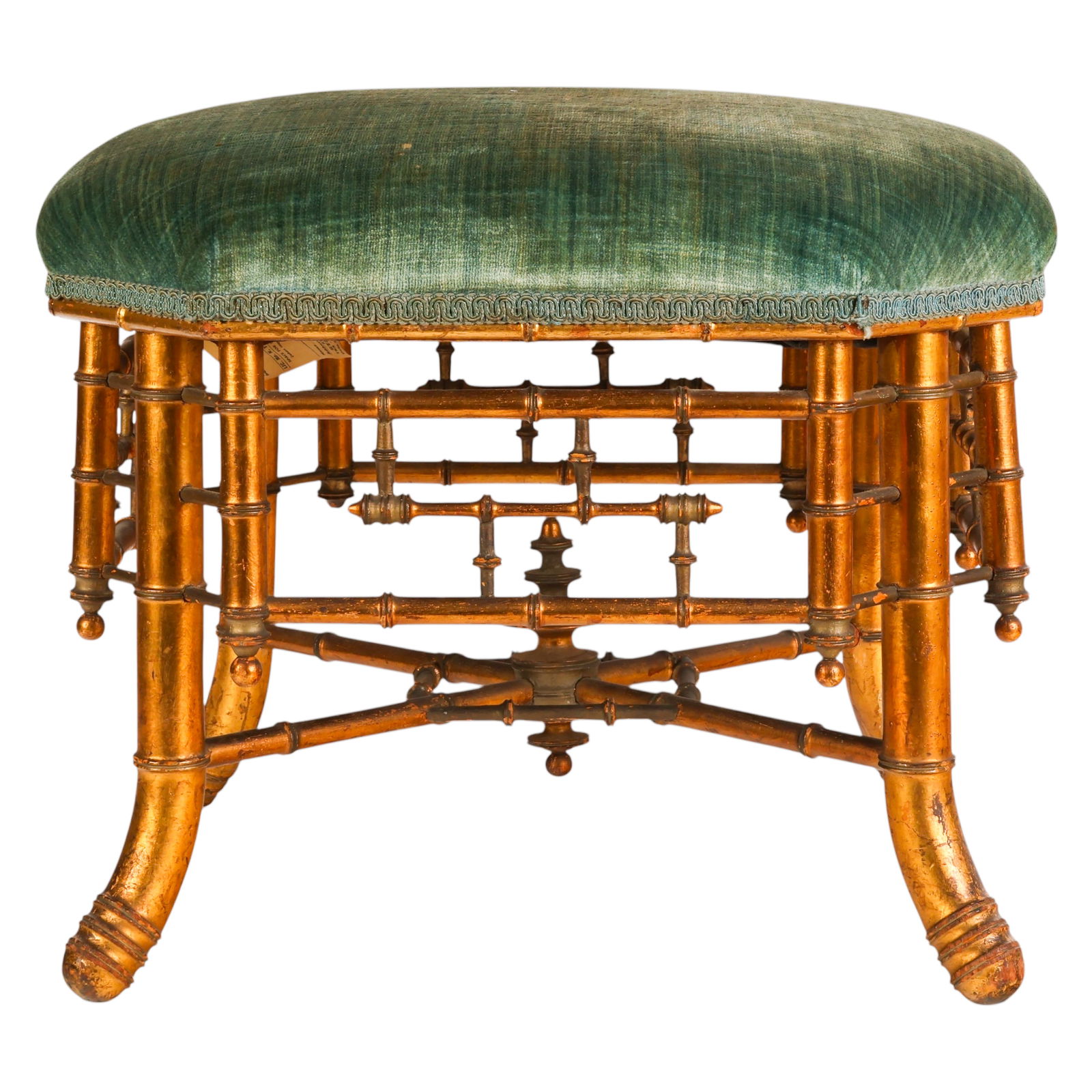 Antique English Chinoiserie Gilt Bamboo Form Stool: English chinoiserie gilt wood, an antique stool in the Chinese taste featuring a rectangular upholstered seat raised on gilt bamboo form legs joined by stretchers with a turned central support, the