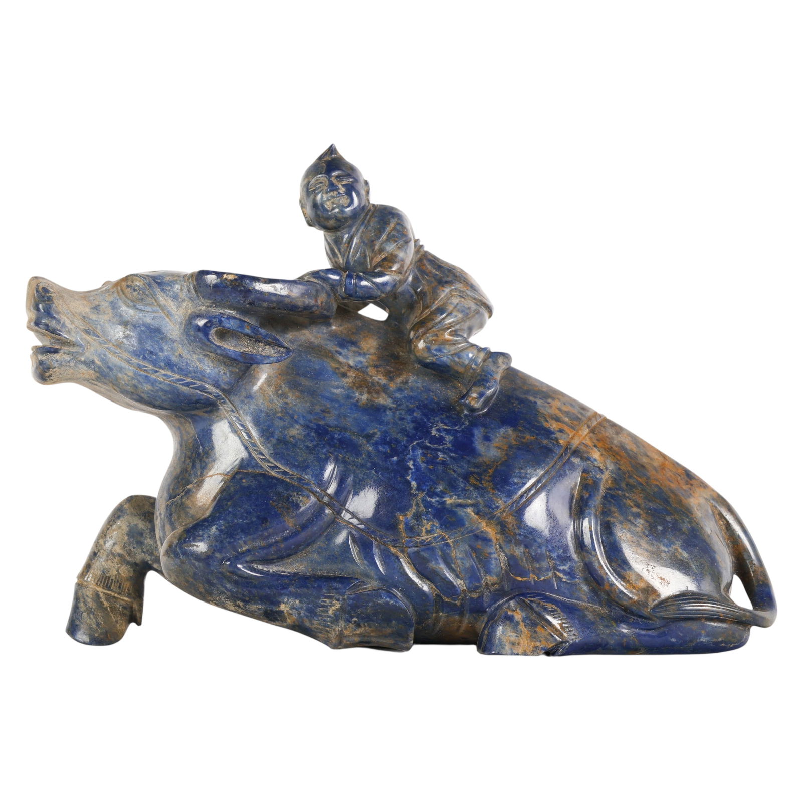 Chinese 17th C Lapis Lazuli Boy on Water Buffalo: Chinese 17th Century lapis lazuli, a carved natural stone figure depicting a boy seated atop a recumbent water buffalo and holding the animals horns, the composition rendered with rounded forms and ex
