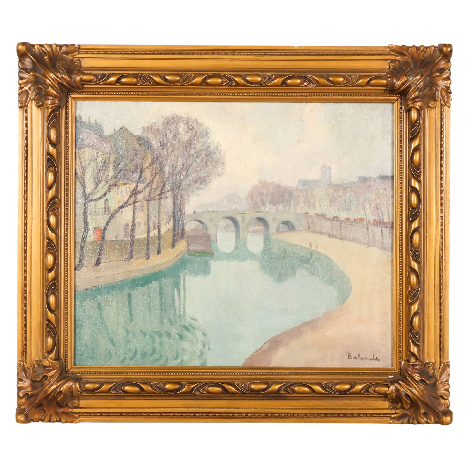 Gaston Balande 1880-1971 River Landscape Painting: Gaston Balande (French, 1880-1971), an antique oil on canvas landscape depicting a stone bridge spanning calm water bordered by a tree lined embankment, with surrounding architecture and foliage refle