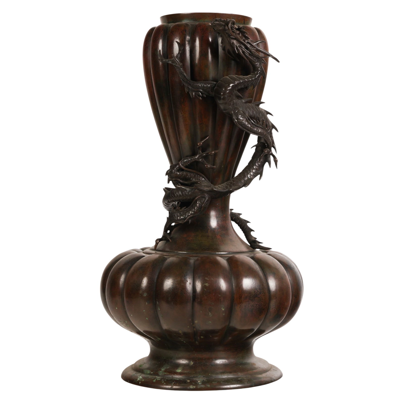 Japanese Meiji Bronze Ribbed Dragon Baluster Vase: Japanese Meiji period, a bronze vase of ribbed baluster form featuring a dynamic figural dragon coiled sinuously around the body. The dragon is finely modeled with textured scales, flowing whiskers, a