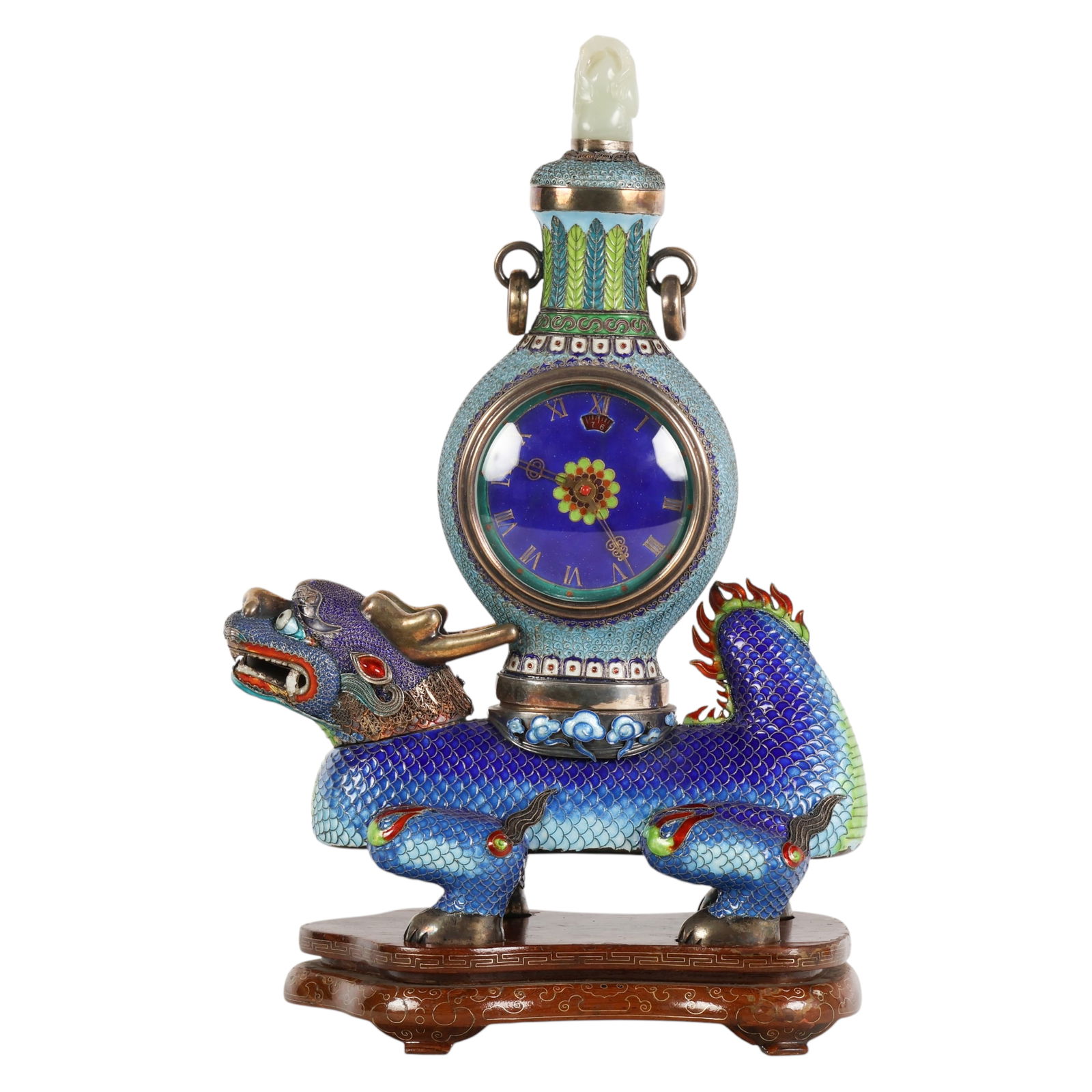 Chinese Silver Enamel and Jade Dragon Mantel Clock: Chinese, antique silver cloisonne mantel clock modeled as a covered vessel resting upon a blue mythical guardian beast resembling a dragon. The surface is decorated with blue, green, red, and white en