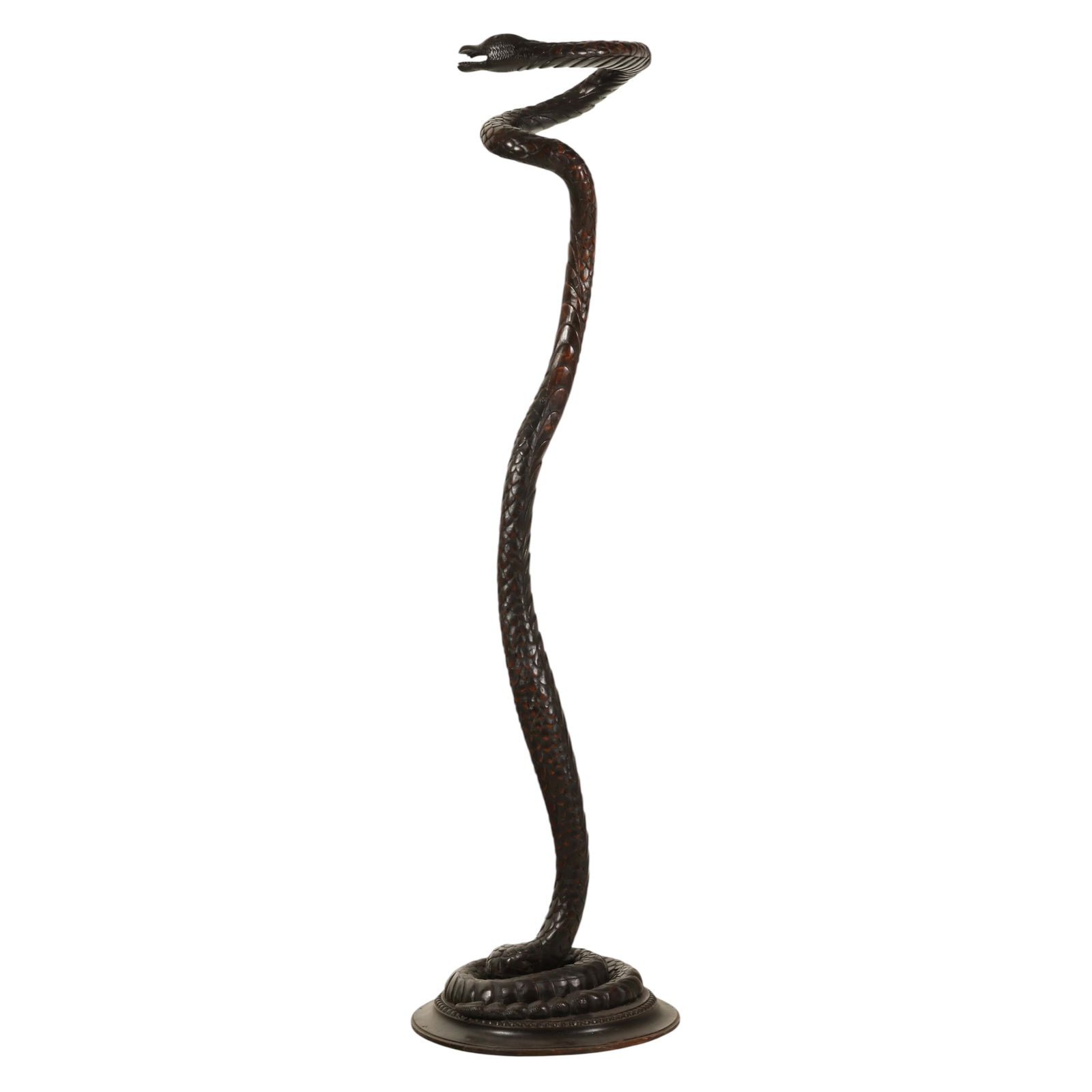 Antique Standing Sculptural Wooden Wild Serpent: American School, an antique carved wood sculpture depicting a coiled snake in a dynamic pose with open mouth and defined fangs. The body is intricately detailed with overlapping scales that emphasize