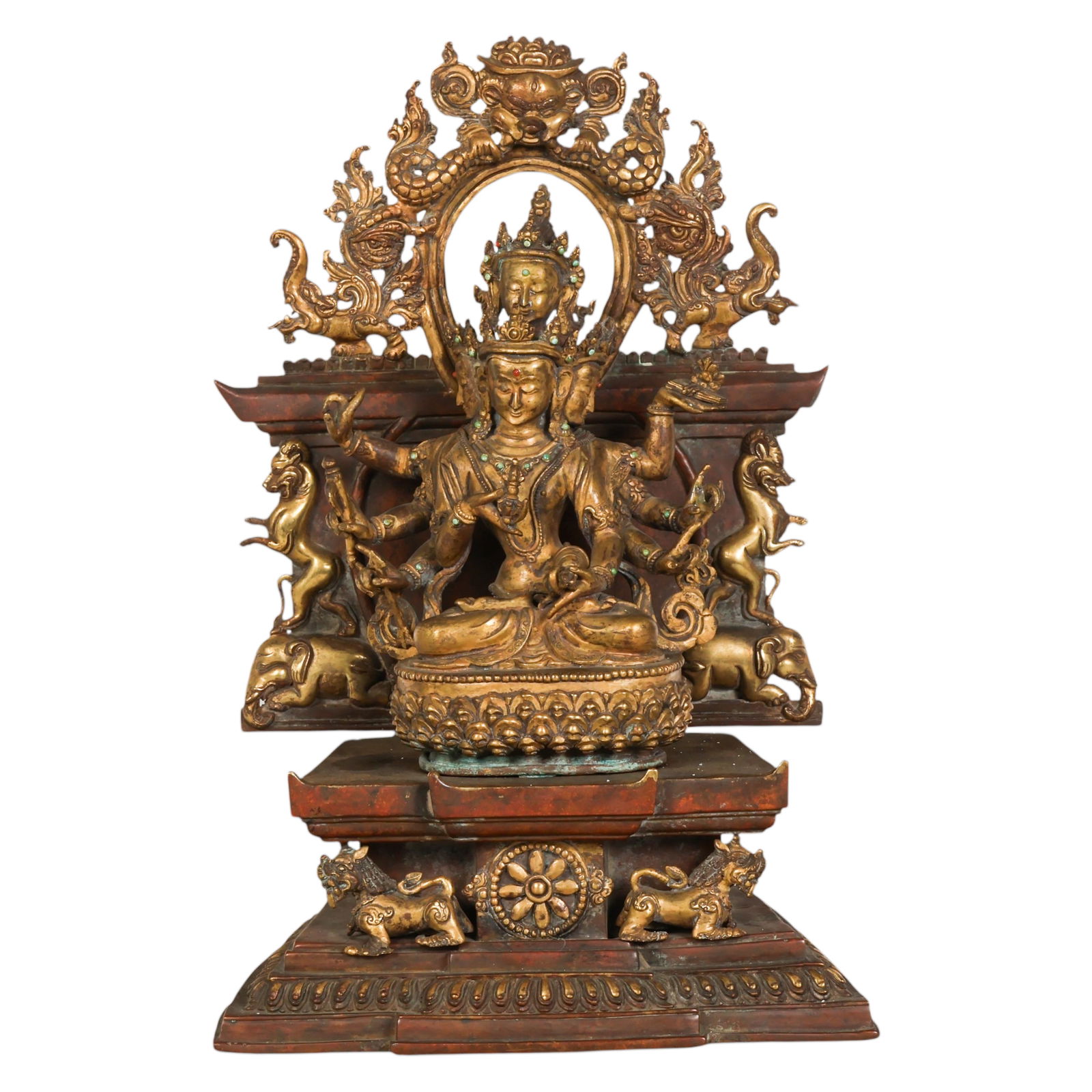 Antique Bronze Embellished Buddha Deity Statue: Tibetan or Nepalese School, antique bronze Buddhist devotional statue 17th century depicting a multi armed deity wearing an elaborate crown with integrated canopy and backplate. The figure is seated o