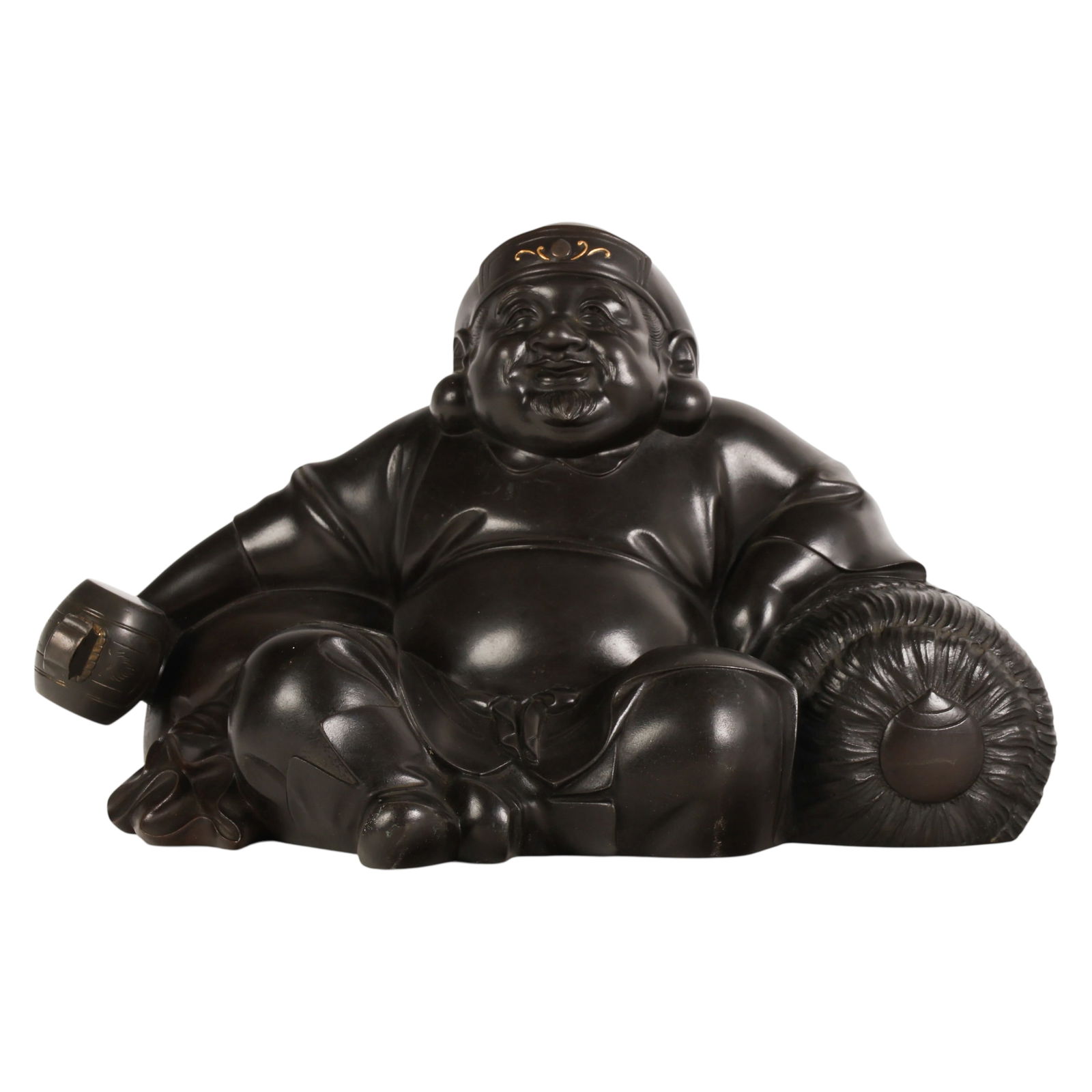 Takumin Saku Bronze Daikoku Okimono Statue SIGNED: Takumin Saku Japanese, a Meiji style bronze okimono sculpture depicting Daikoku seated holding a mallet and resting beside a rice bale, the figure cast with smooth surfaces and finely detailed facial
