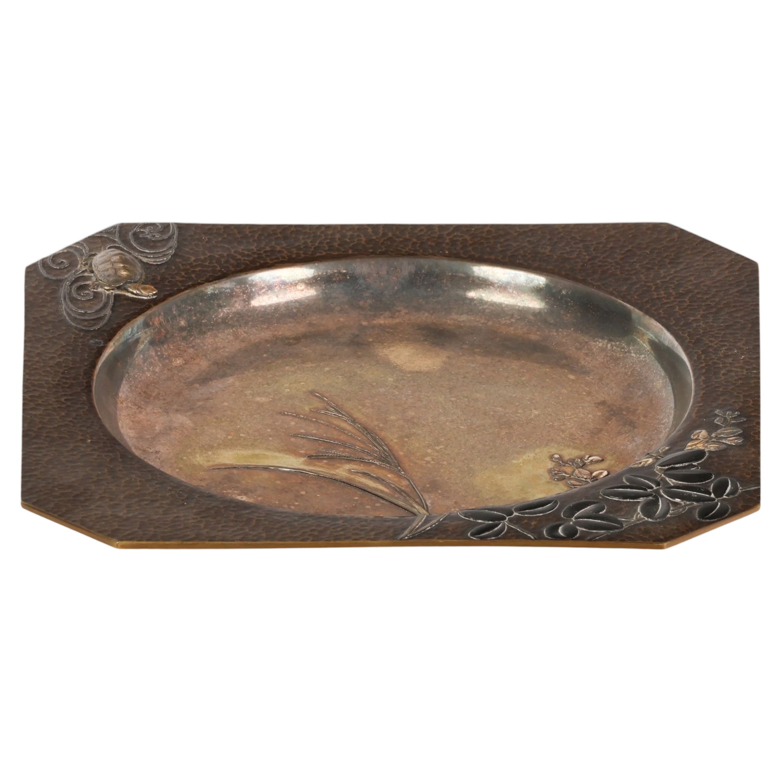 Japanese Mixed Metal Turtle Repousse Dish SIGNED: Japanese Meiji period mixed metal work, a square bronze plate featuring a circular recessed well adorned with applied decoration including a raised silvered turtle gliding through stylized waves,