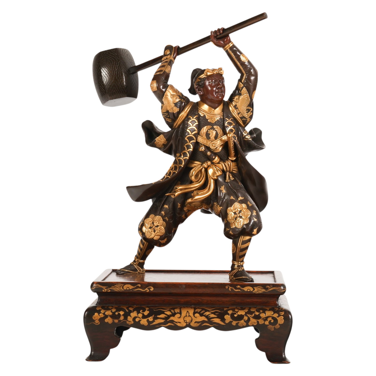 Japanese Miyao Bronze Warrior Okimono Sculpture: Japanese signed Meiji period bronze okimono depicting a warrior in a wide stance holding a raised mallet above his head. The figure is decorated with applied gilt motifs including florals, waves, and