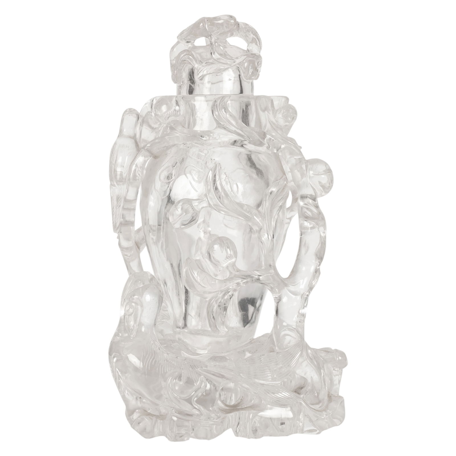 Chinese Rock Crystal Fruits and Bird Covered Vase: Chinese rock crystal, a carved natural crystal lidded urn featuring high relief decoration of birds amid fruiting vines, the body intricately worked with swirling foliage and pierced scrollwork creati