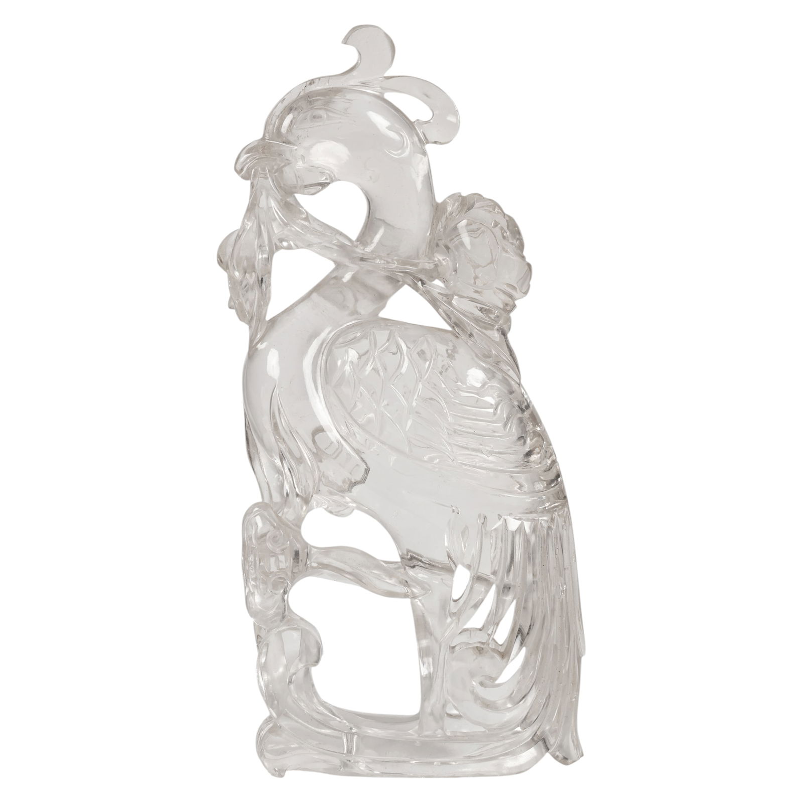 Chinese Carved Rock Crystal Phoenix Bird Sculpture: Chinese rock crystal, a carved natural crystal figure depicting a phoenix perched atop intricately pierced rockwork, the bird rendered with an elaborate crest and finely layered tail feathers cascadin
